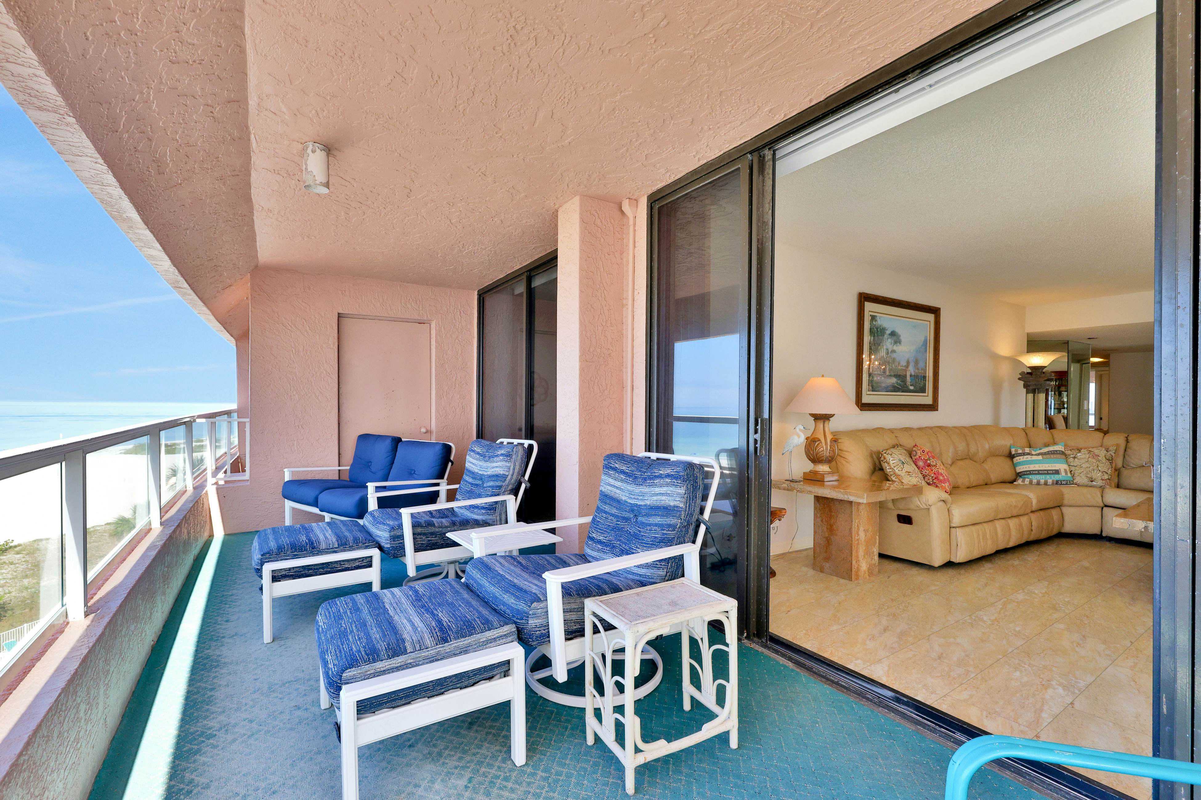 Beachfront condo with multiple balconies, heated pool, gym, hot tub & AC