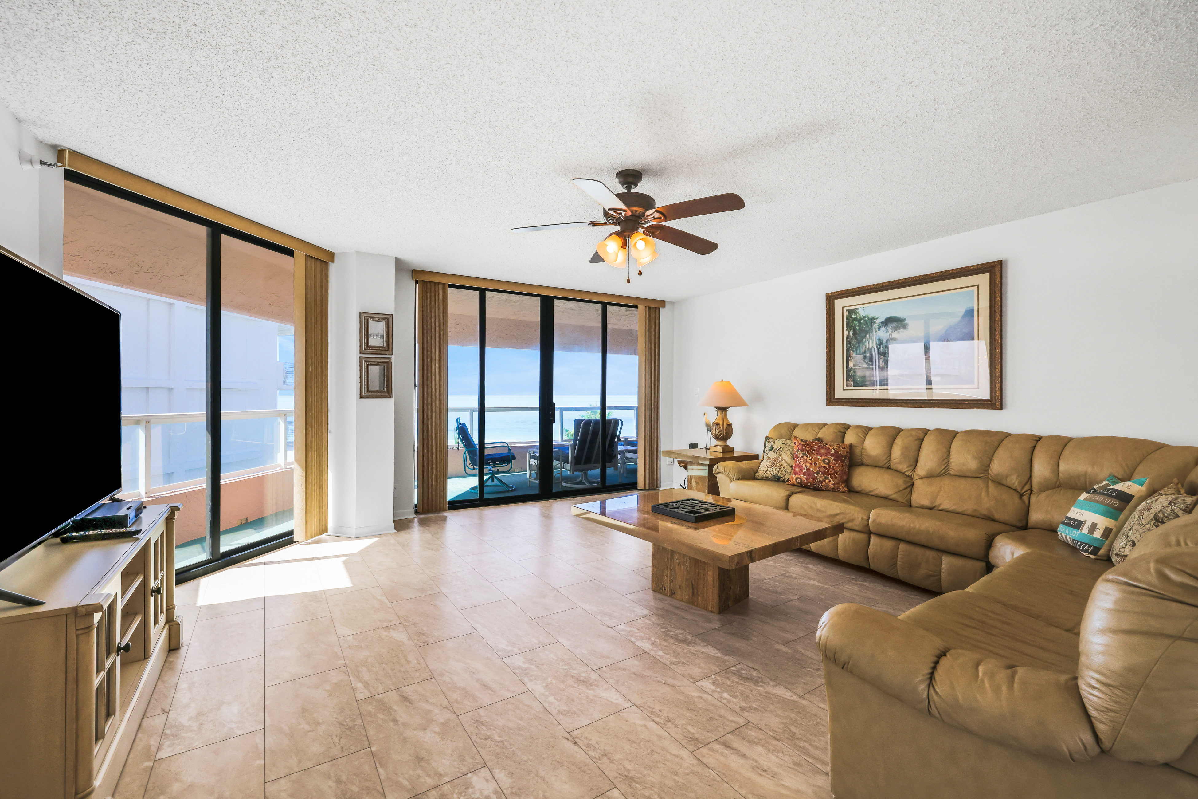 Beachfront condo with multiple balconies heated pool gym hot tub and AC