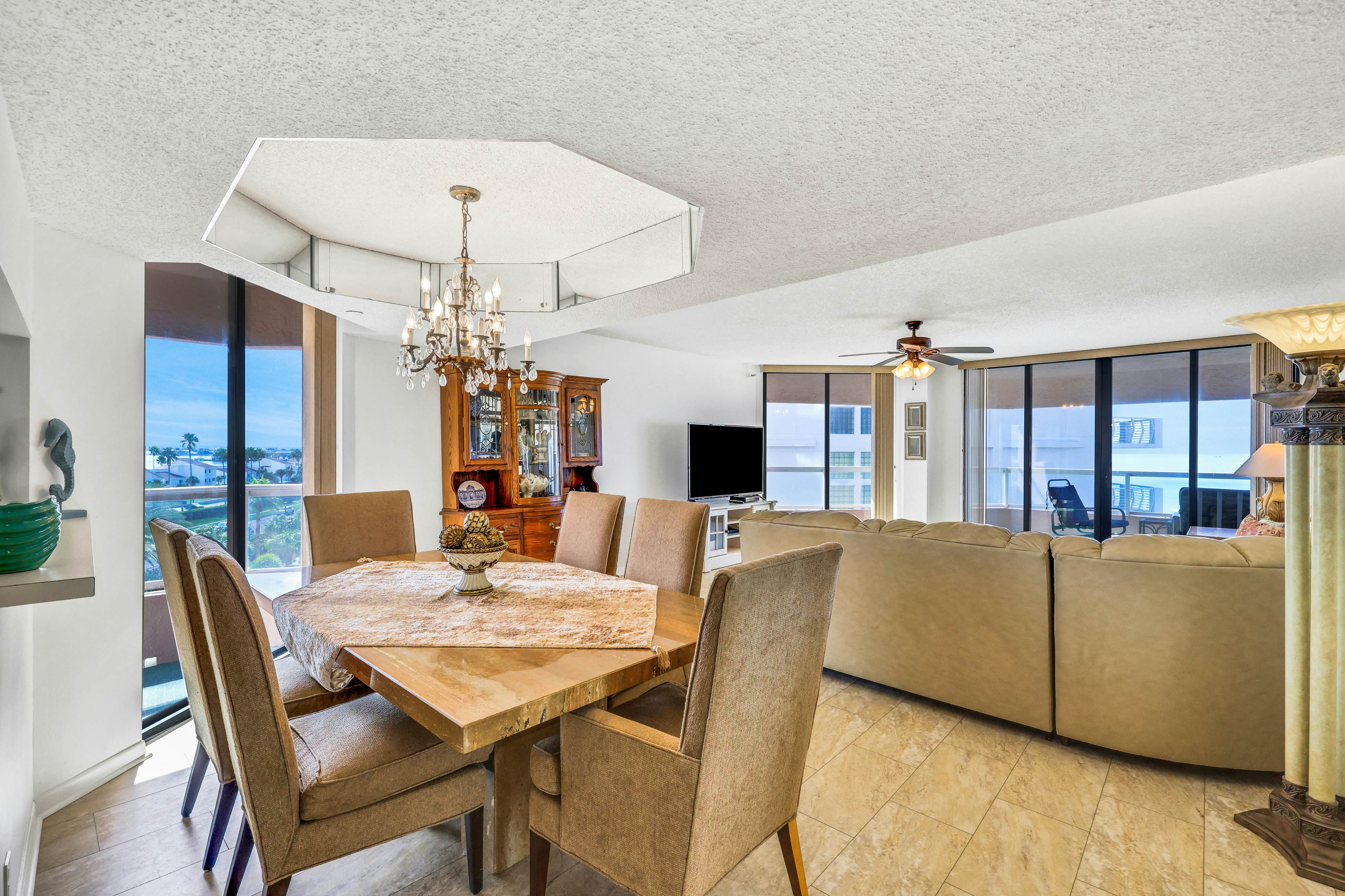 Beachfront condo with multiple balconies, heated pool, gym, hot tub & AC