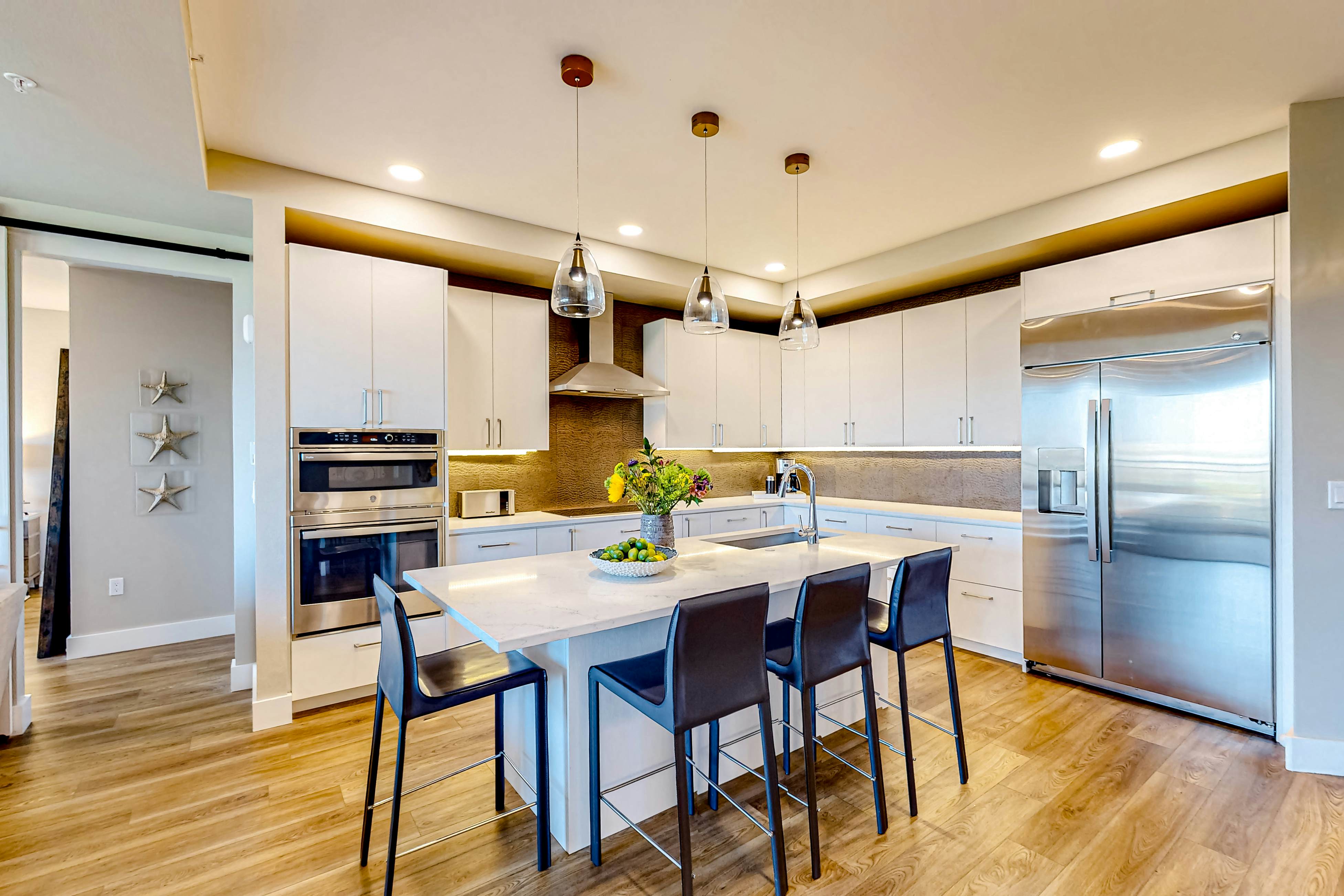 Brand-new condo steps to beach with balcony, pool, & hot tub - dog-friendly