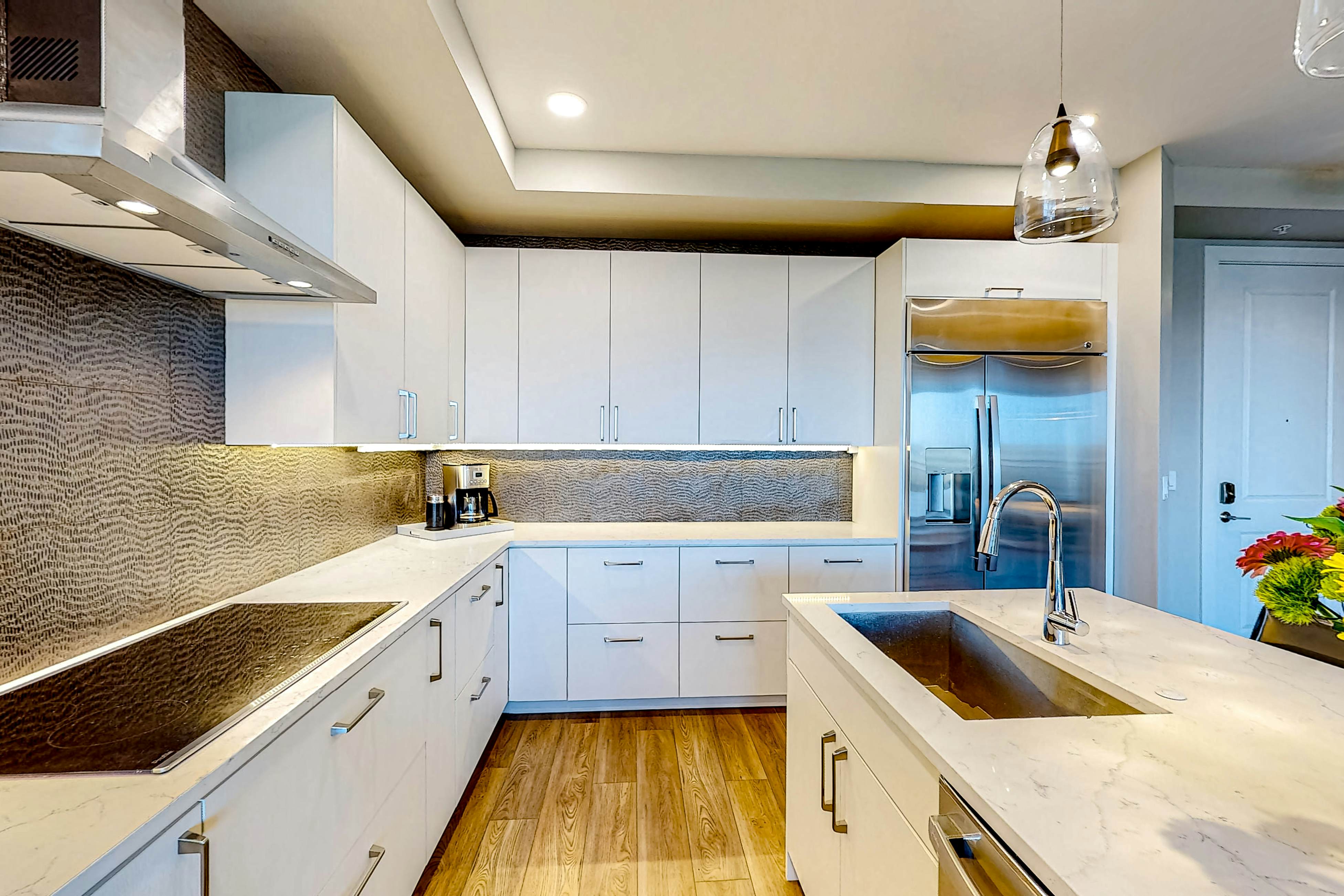 Brand-new condo steps to beach with balcony, pool, & hot tub - dog-friendly