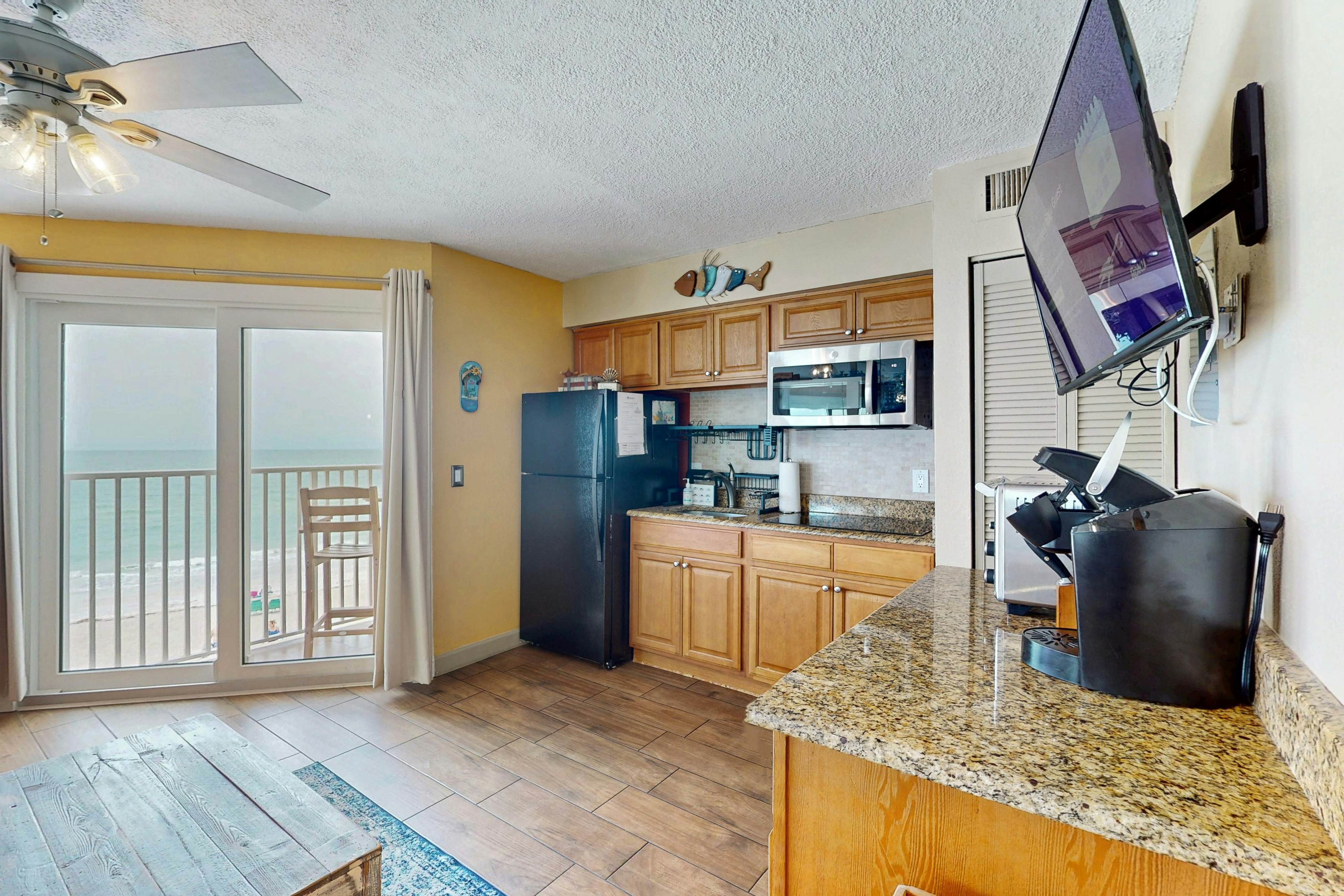 Gulf-front condo with pool, beach access, balcony & central AC - dog-friendly
