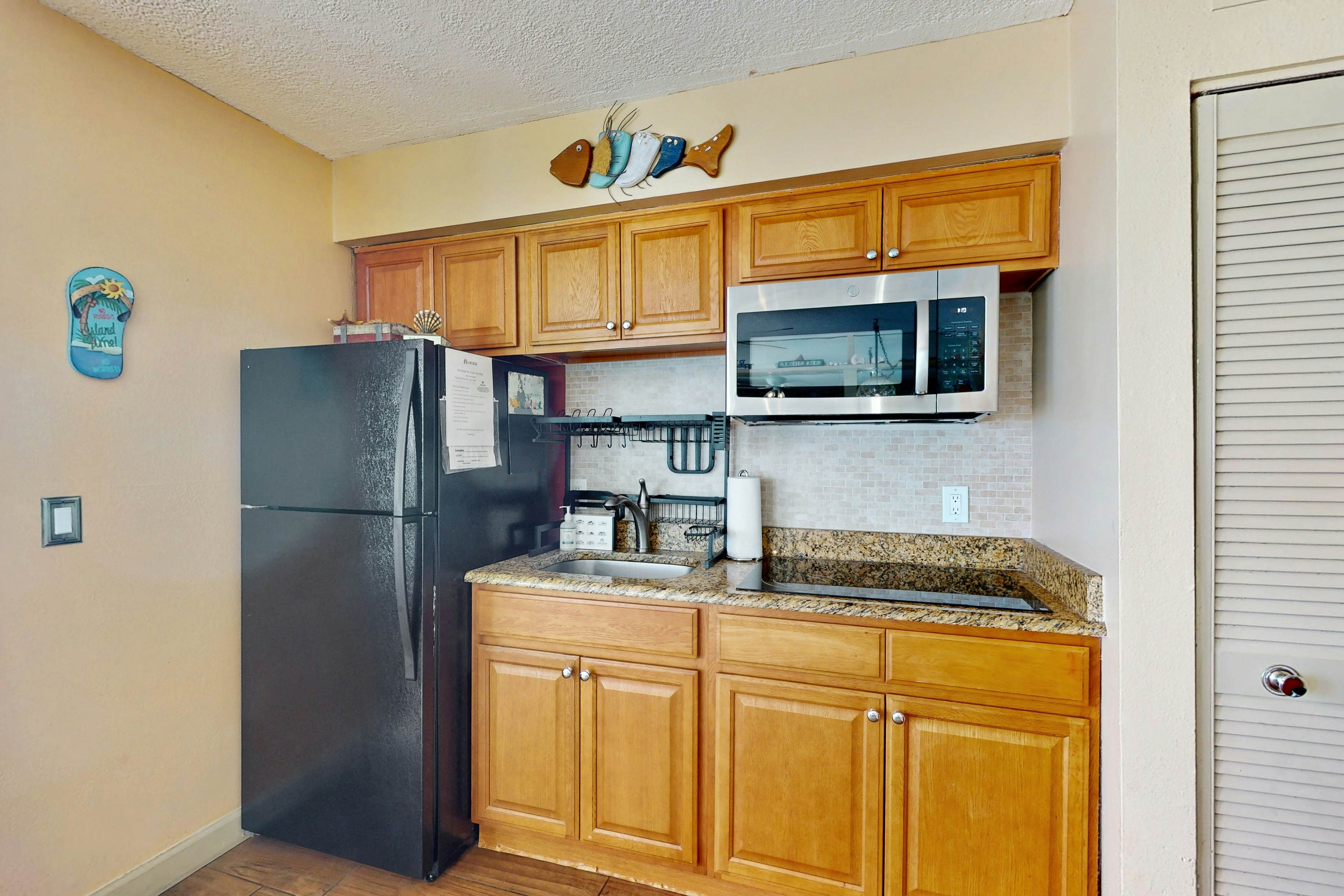 Gulf-front condo with pool, beach access, balcony & central AC - dog-friendly