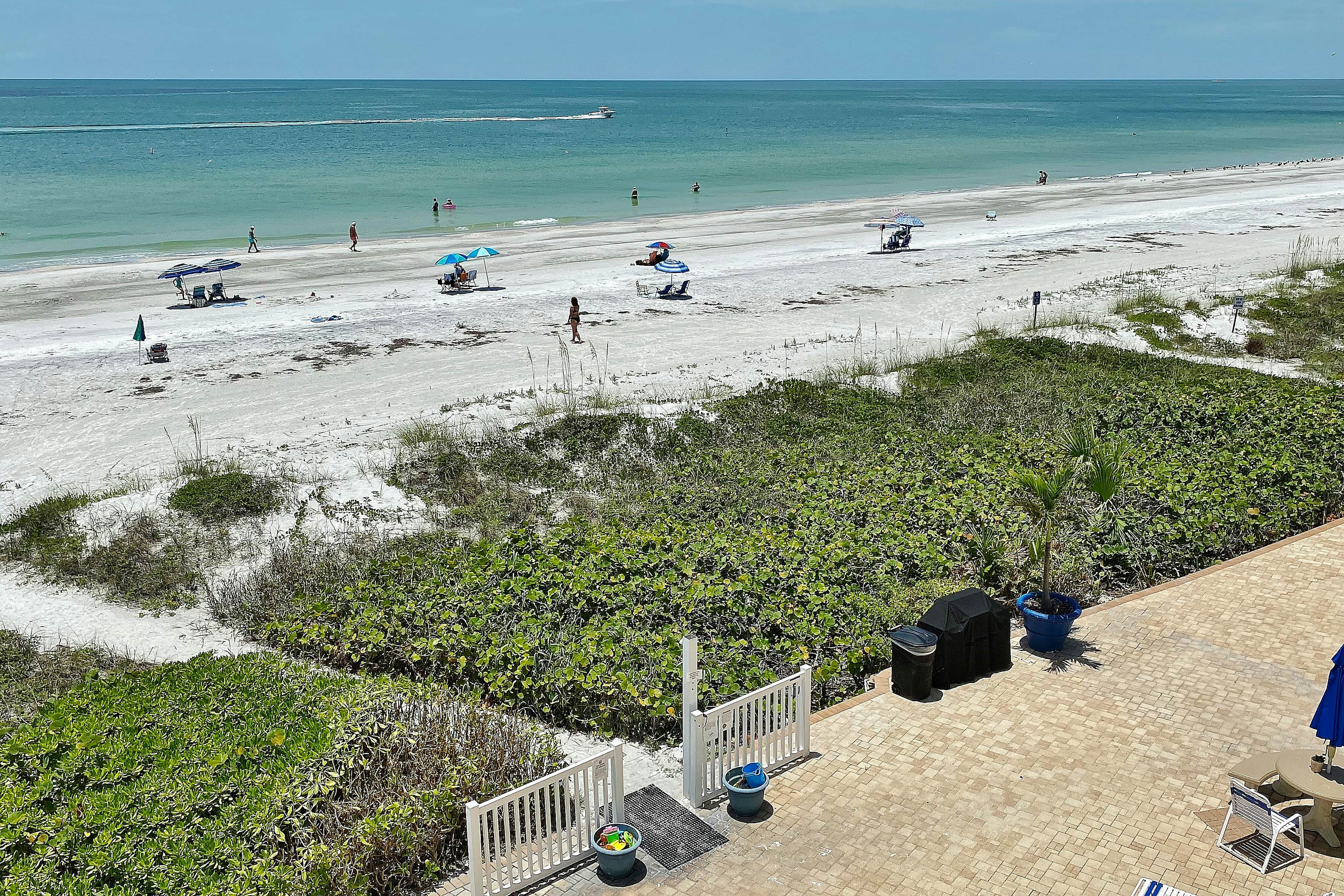 Gulf-front condo with pool, beach access, balcony & central AC - dog-friendly