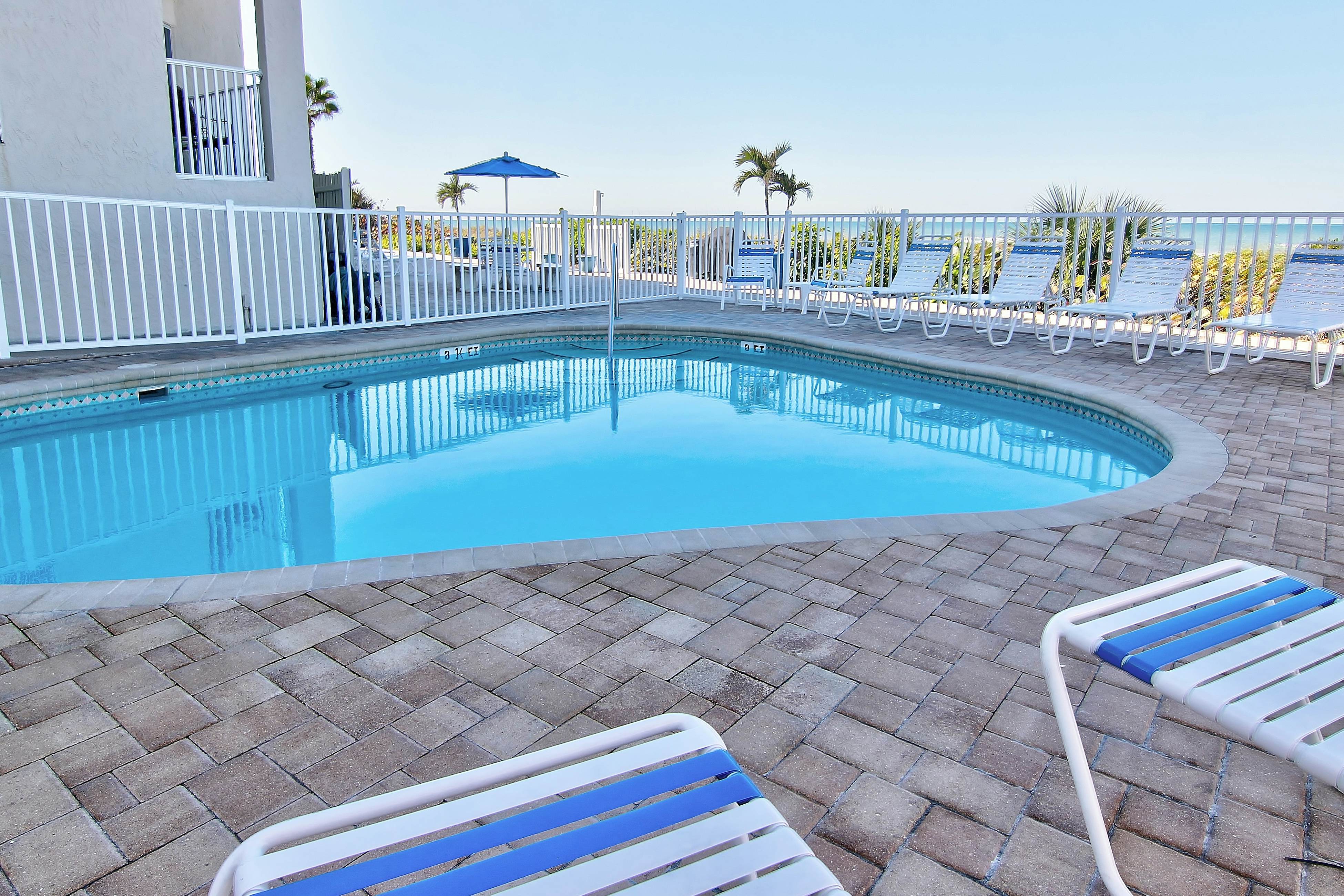 Gulf-front condo with pool, beach access, balcony & central AC - dog-friendly