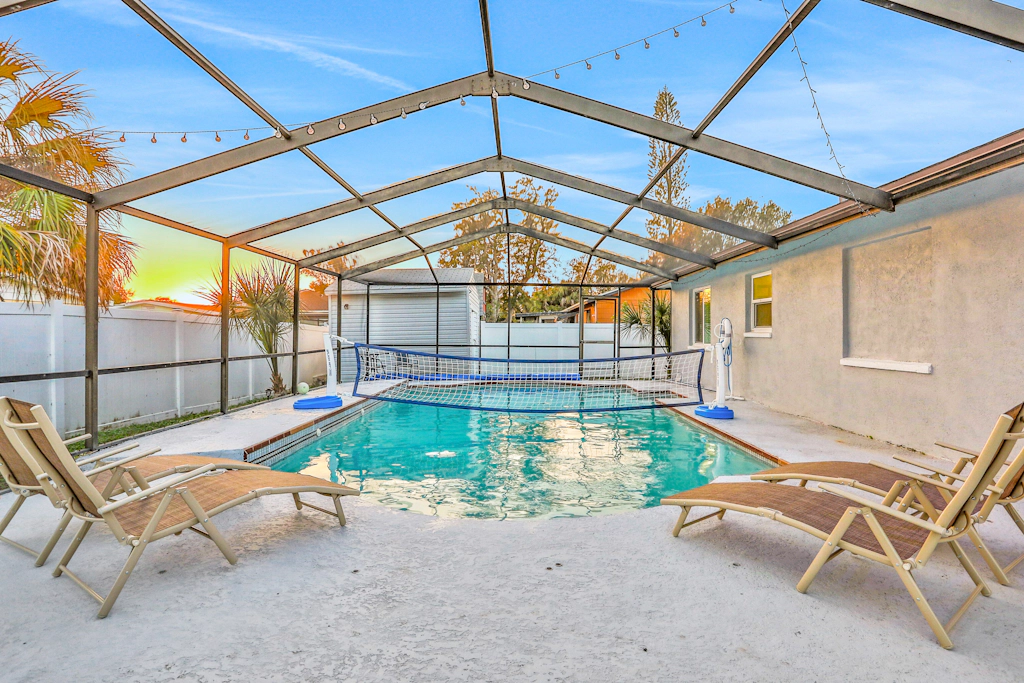 Dog friendly tropical stay with a private pool grill game tables and central AC