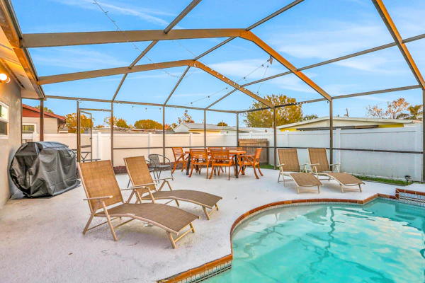 Dog friendly tropical stay with a private pool grill game tables and central AC