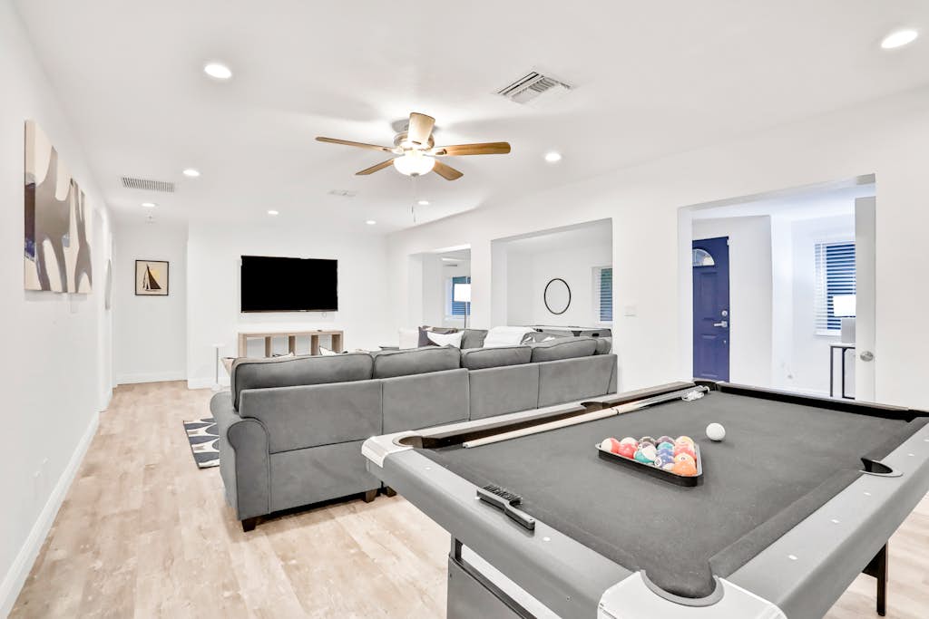 Dog friendly tropical stay with a private pool grill game tables and central AC