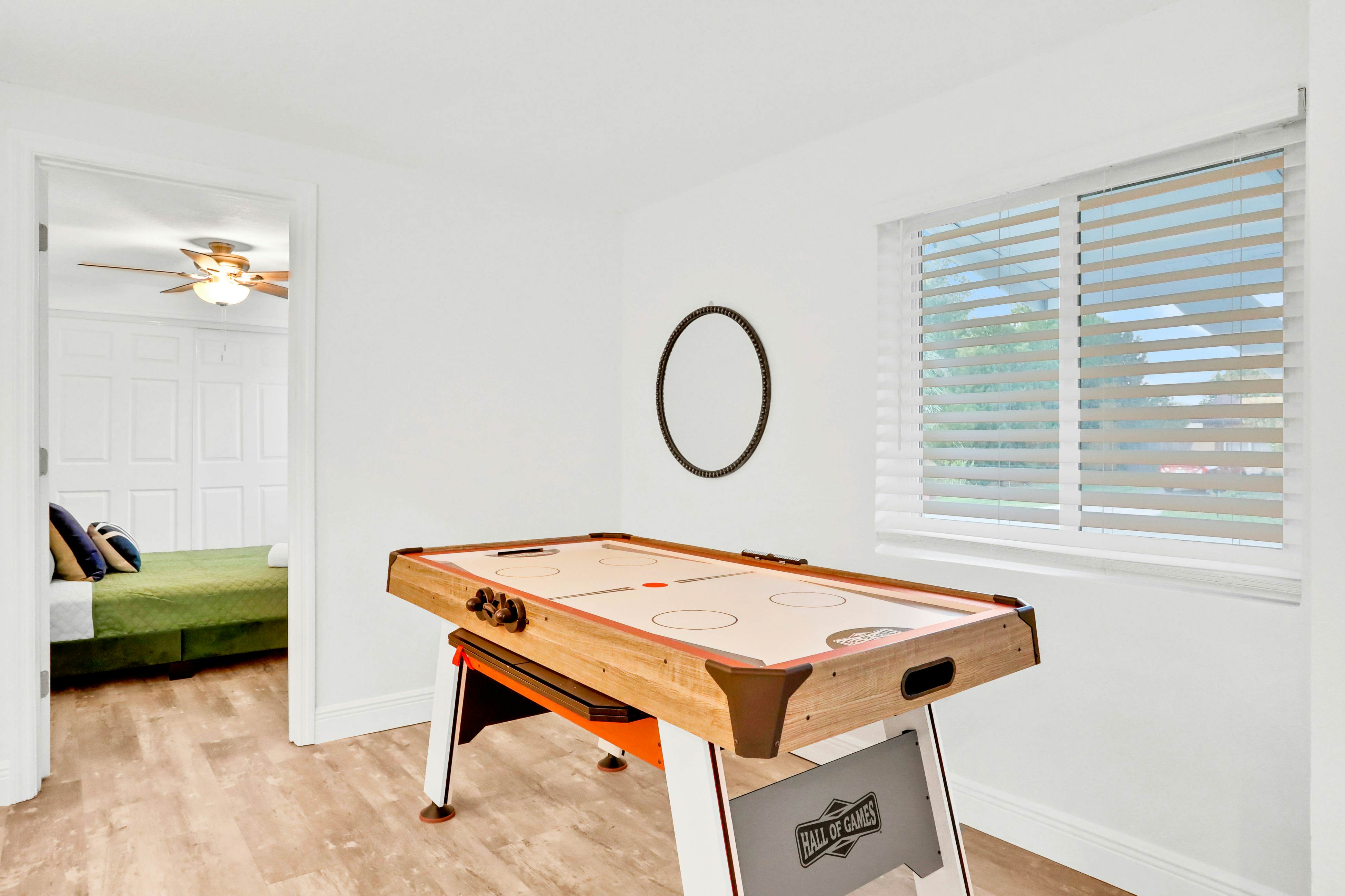 Dog-friendly tropical stay with a private pool, grill, game tables, & central AC