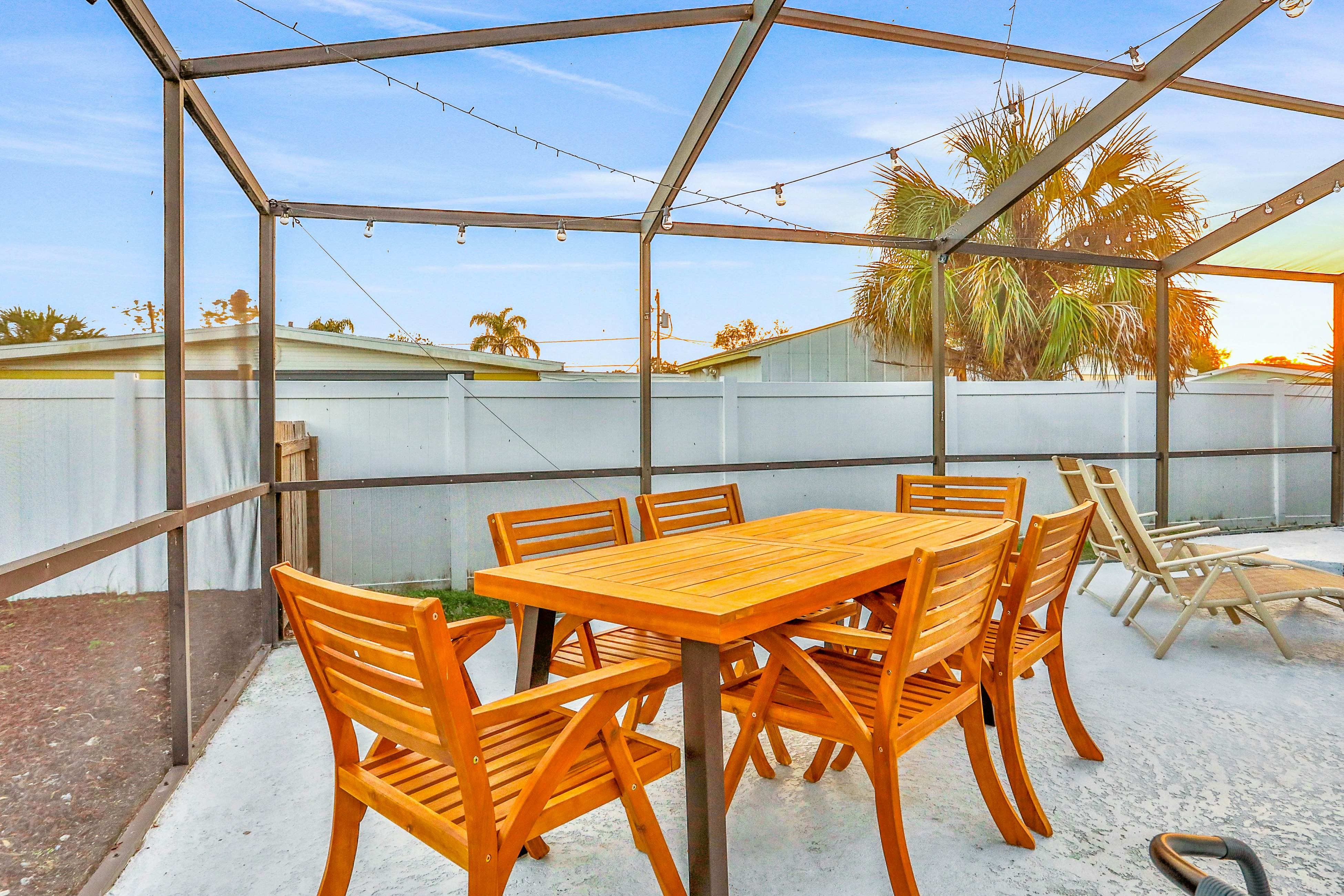 Dog-friendly tropical stay with a private pool, grill, game tables, & central AC