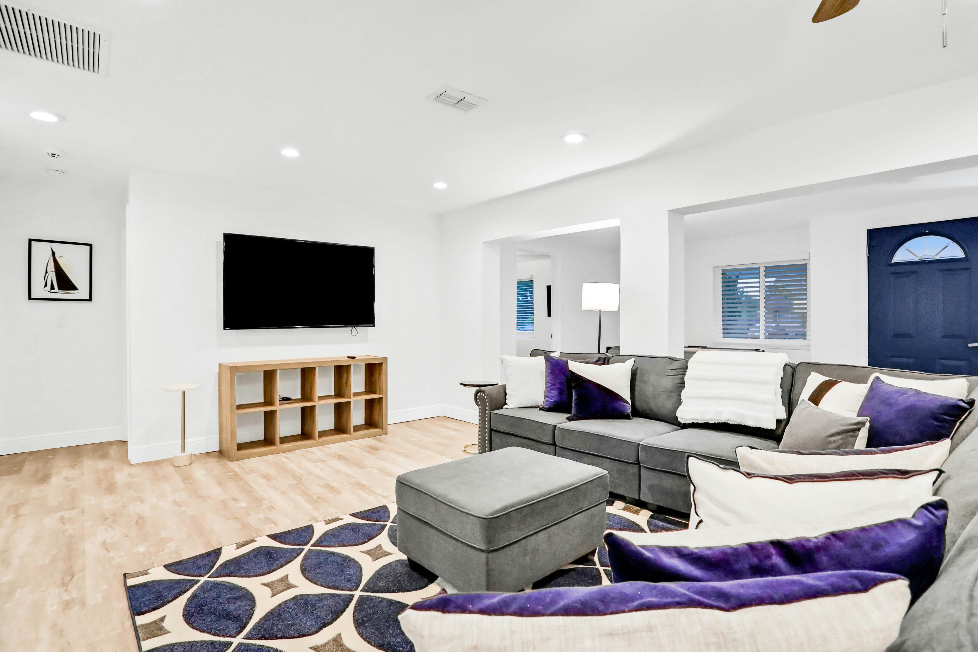 Dog-friendly tropical stay with a private pool, grill, game tables, & central AC