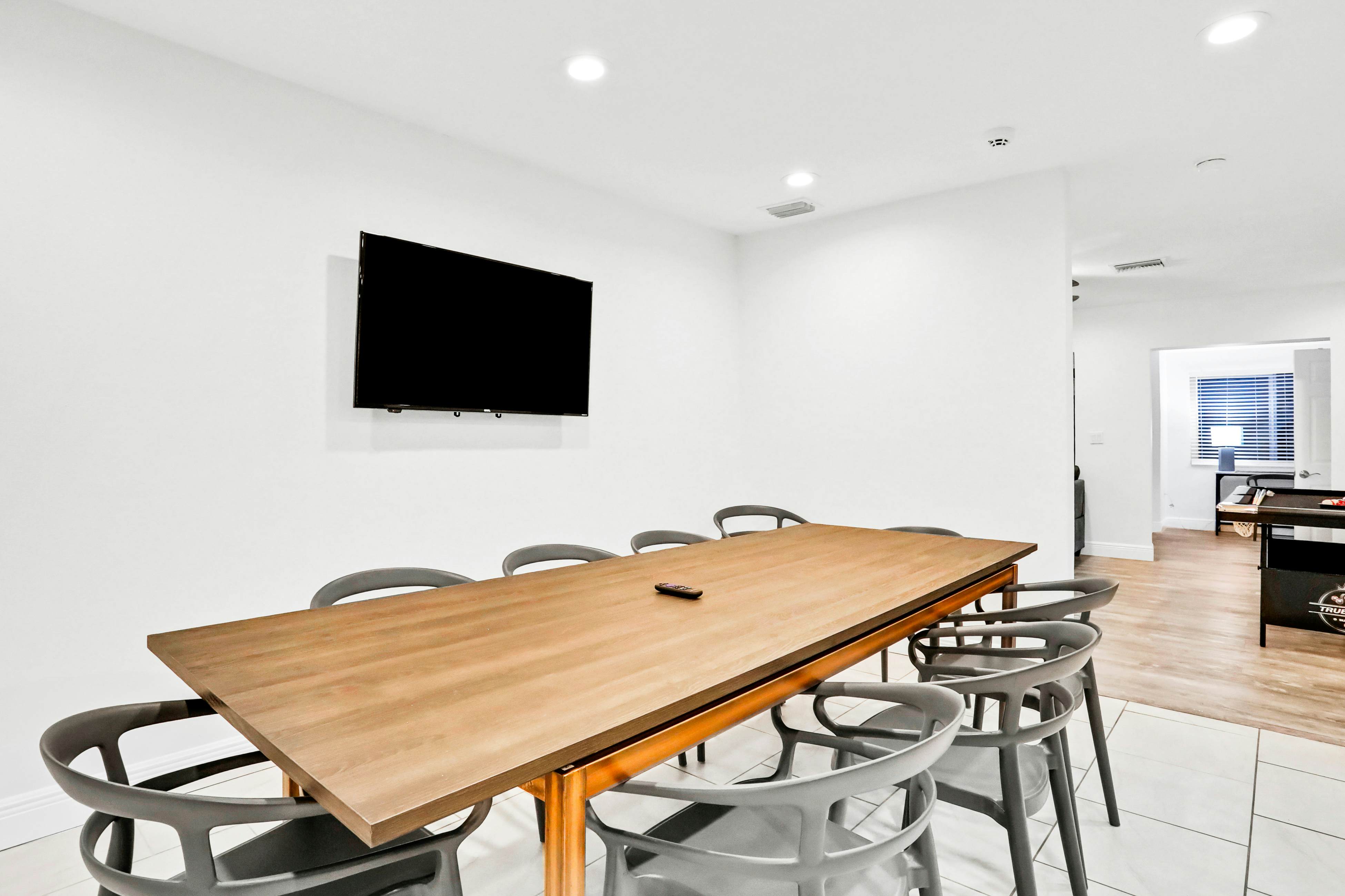 Dog-friendly tropical stay with a private pool, grill, game tables, & central AC