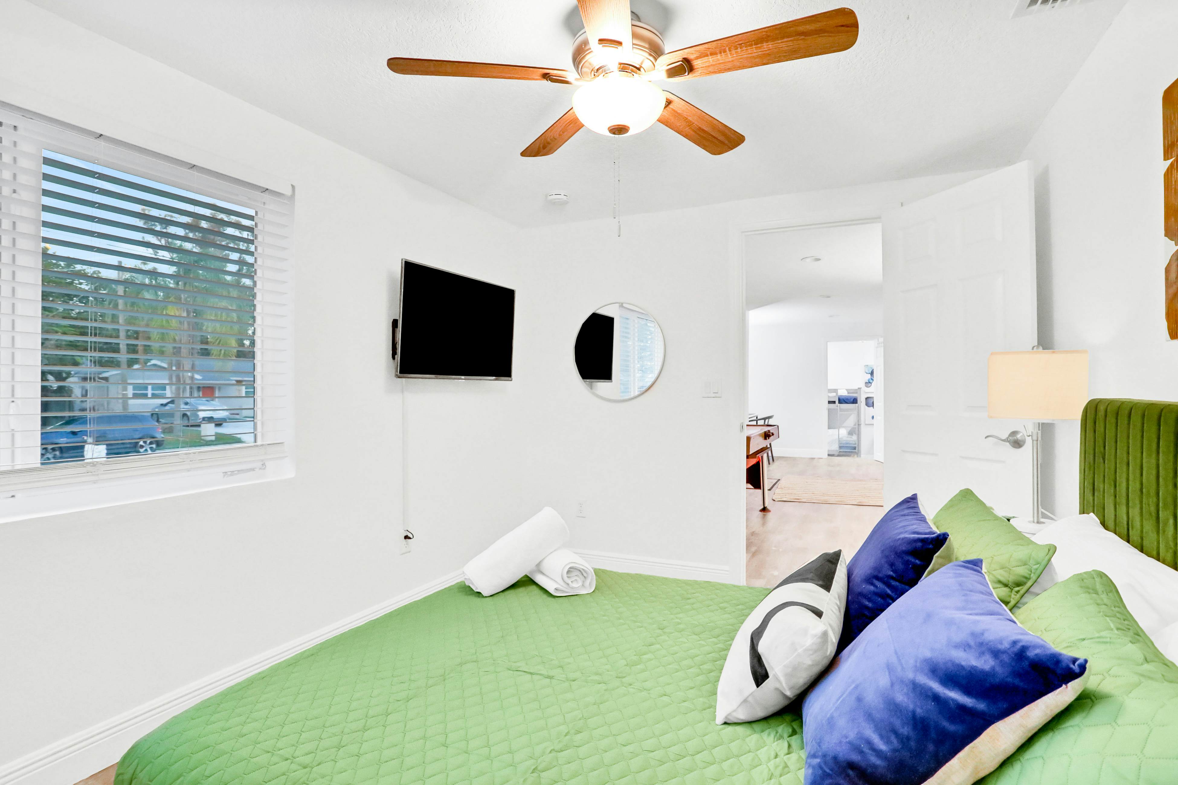 Dog-friendly tropical stay with a private pool, grill, game tables, & central AC