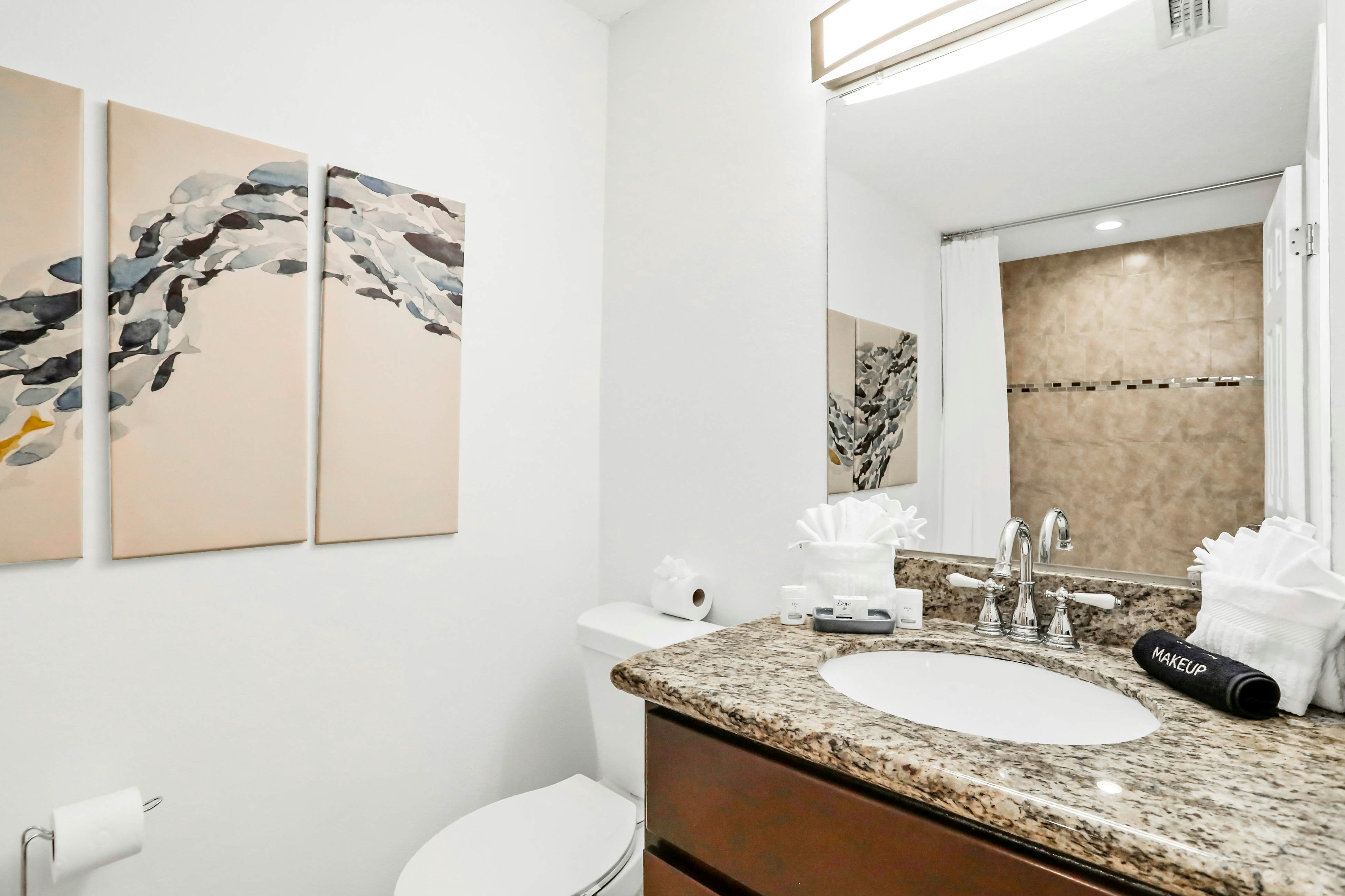 Dog-friendly tropical stay with a private pool, grill, game tables, & central AC