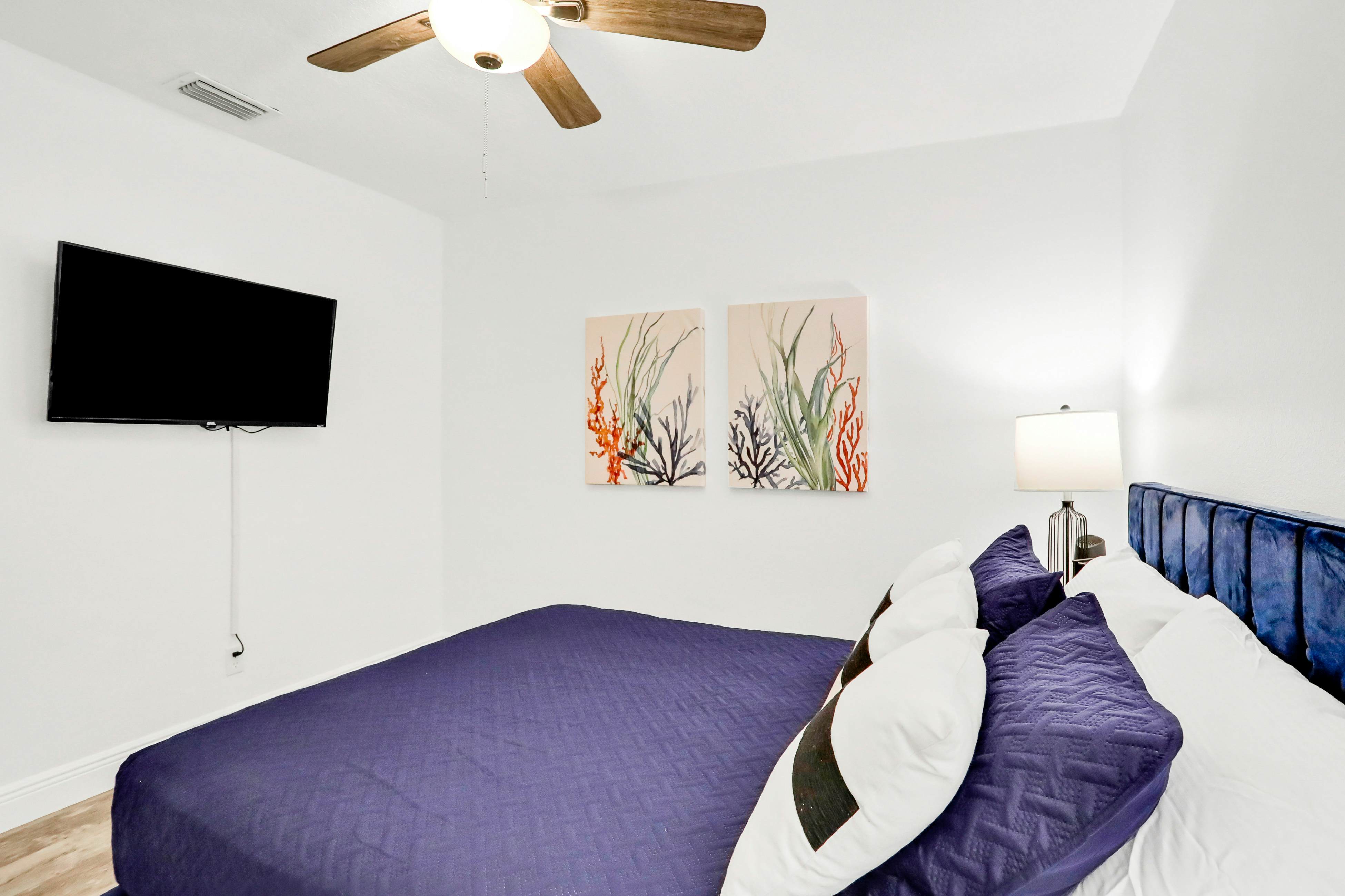 Dog-friendly tropical stay with a private pool, grill, game tables, & central AC