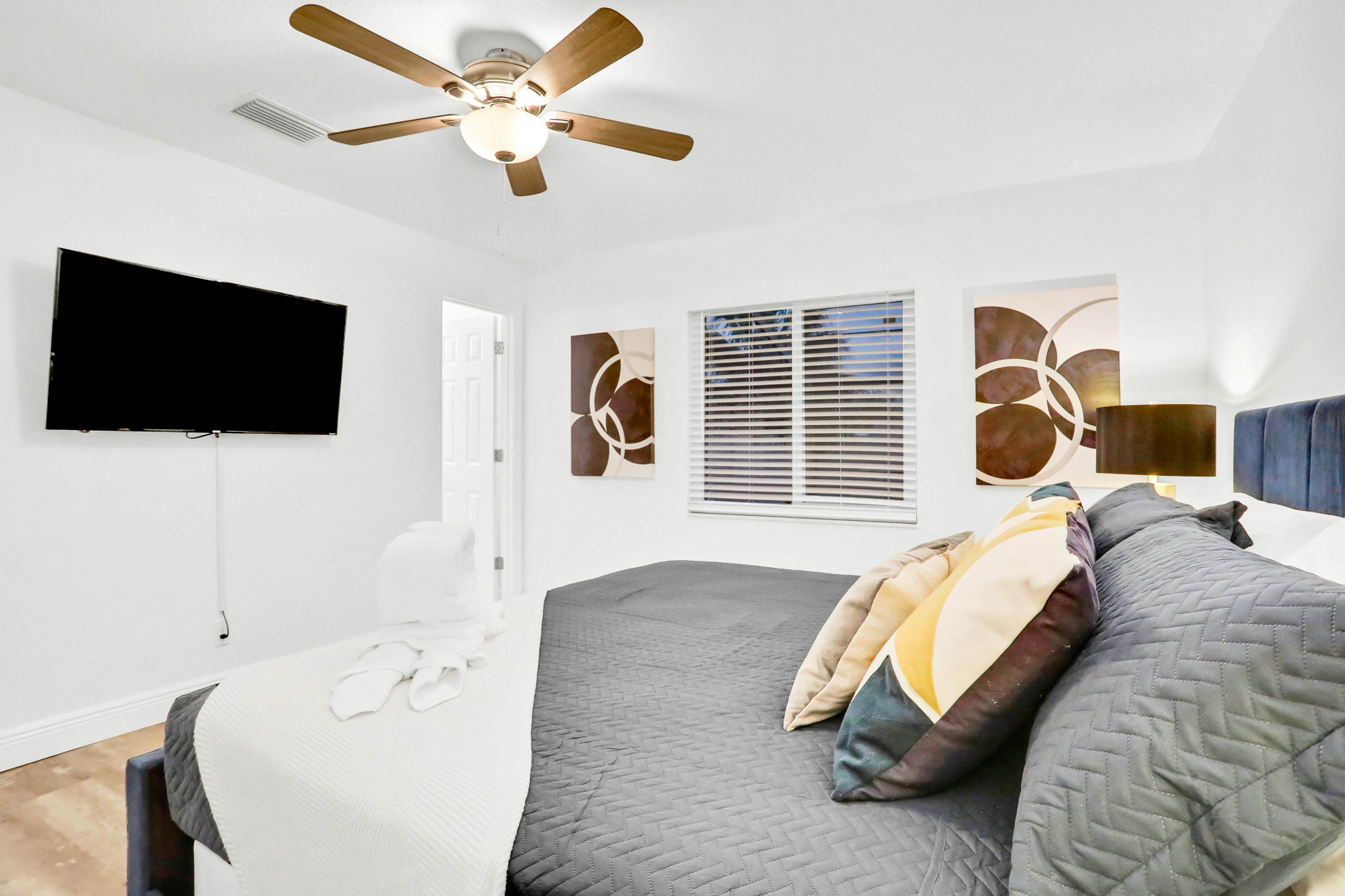 Dog-friendly tropical stay with a private pool, grill, game tables, & central AC