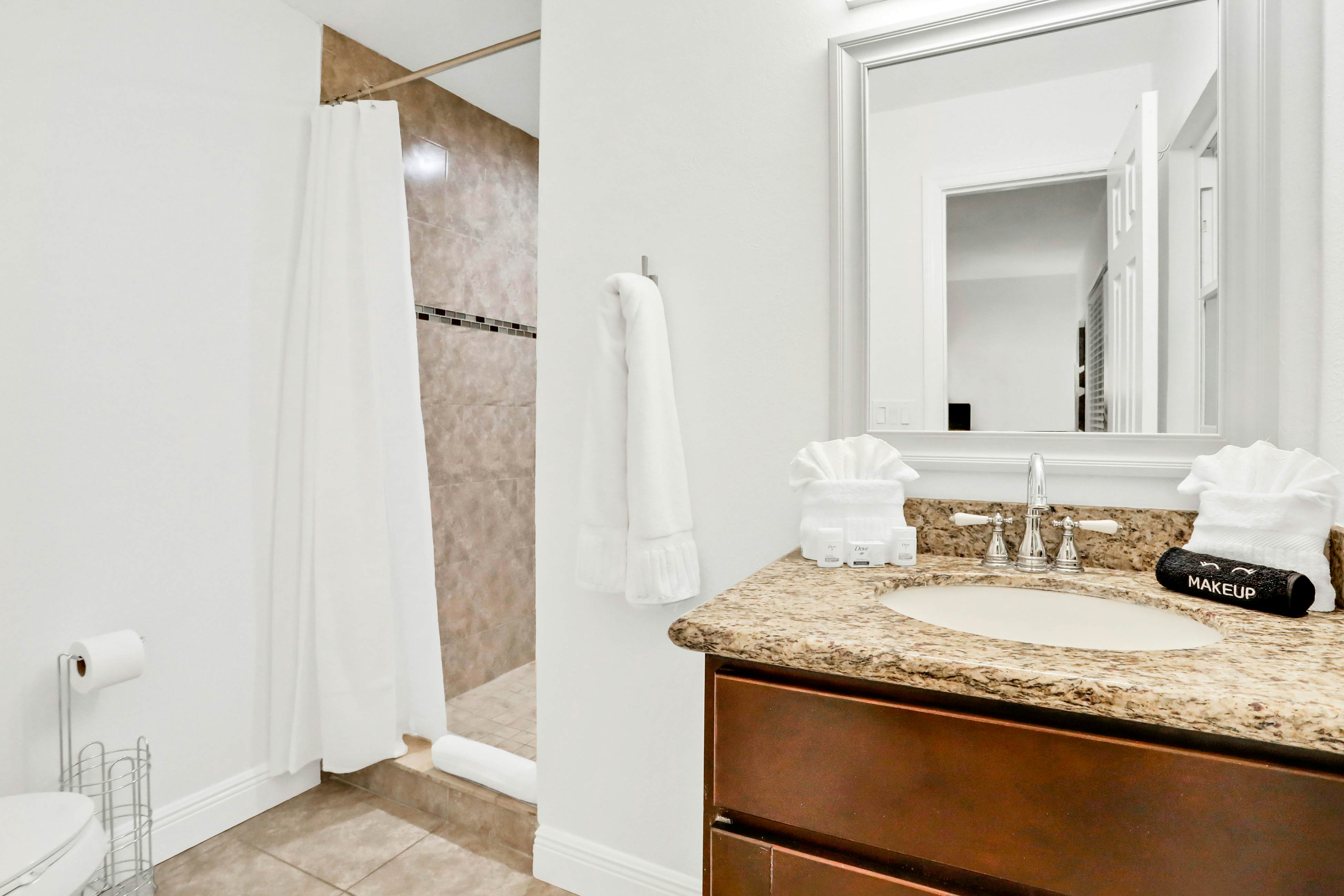 Dog-friendly tropical stay with a private pool, grill, game tables, & central AC