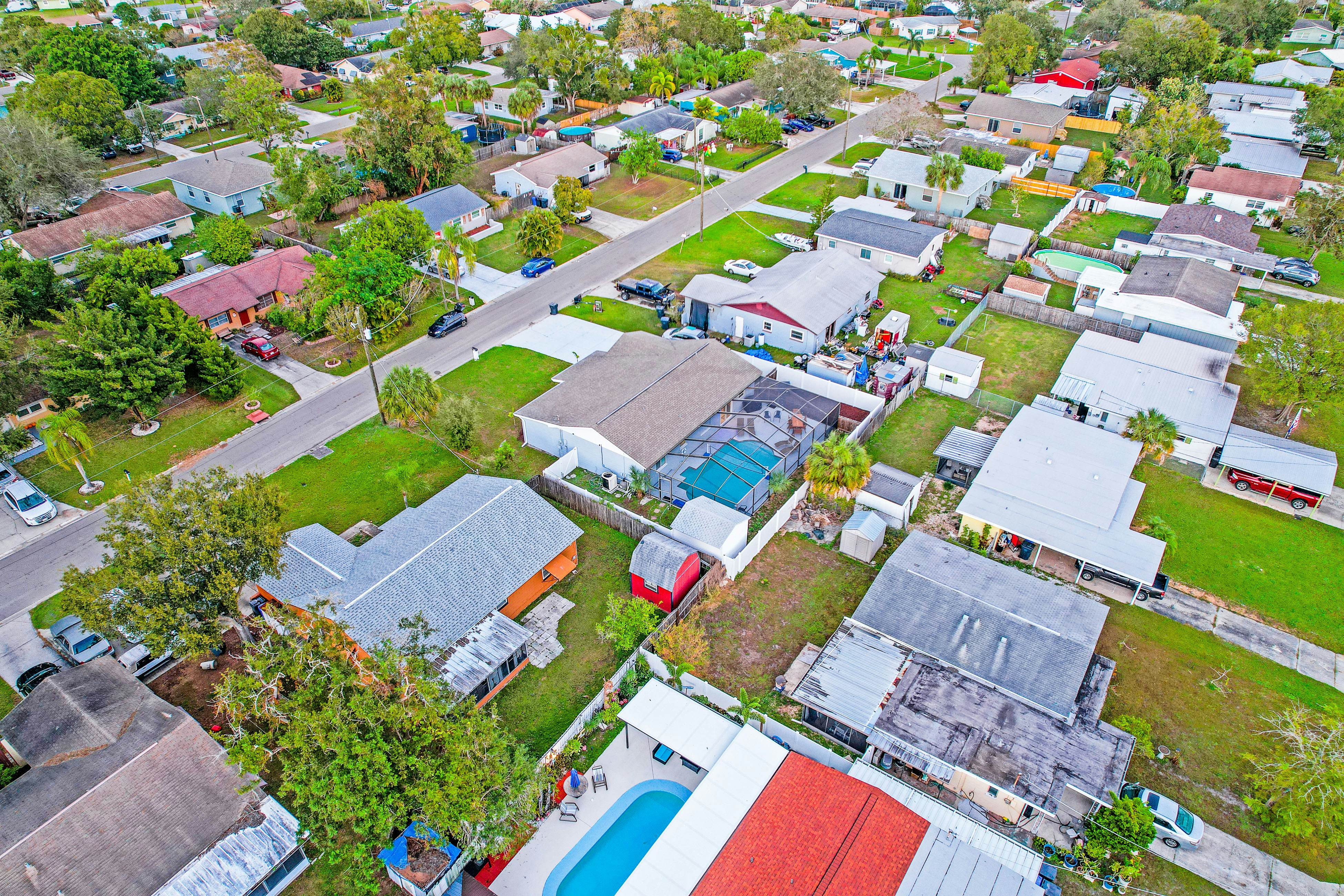 Dog-friendly tropical stay with a private pool, grill, game tables, & central AC