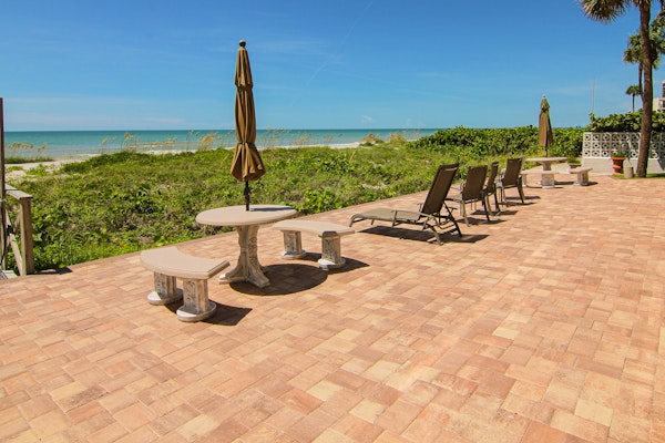 Elegant 1st floor condo w private patio AC on site outdoor pool and gas grills