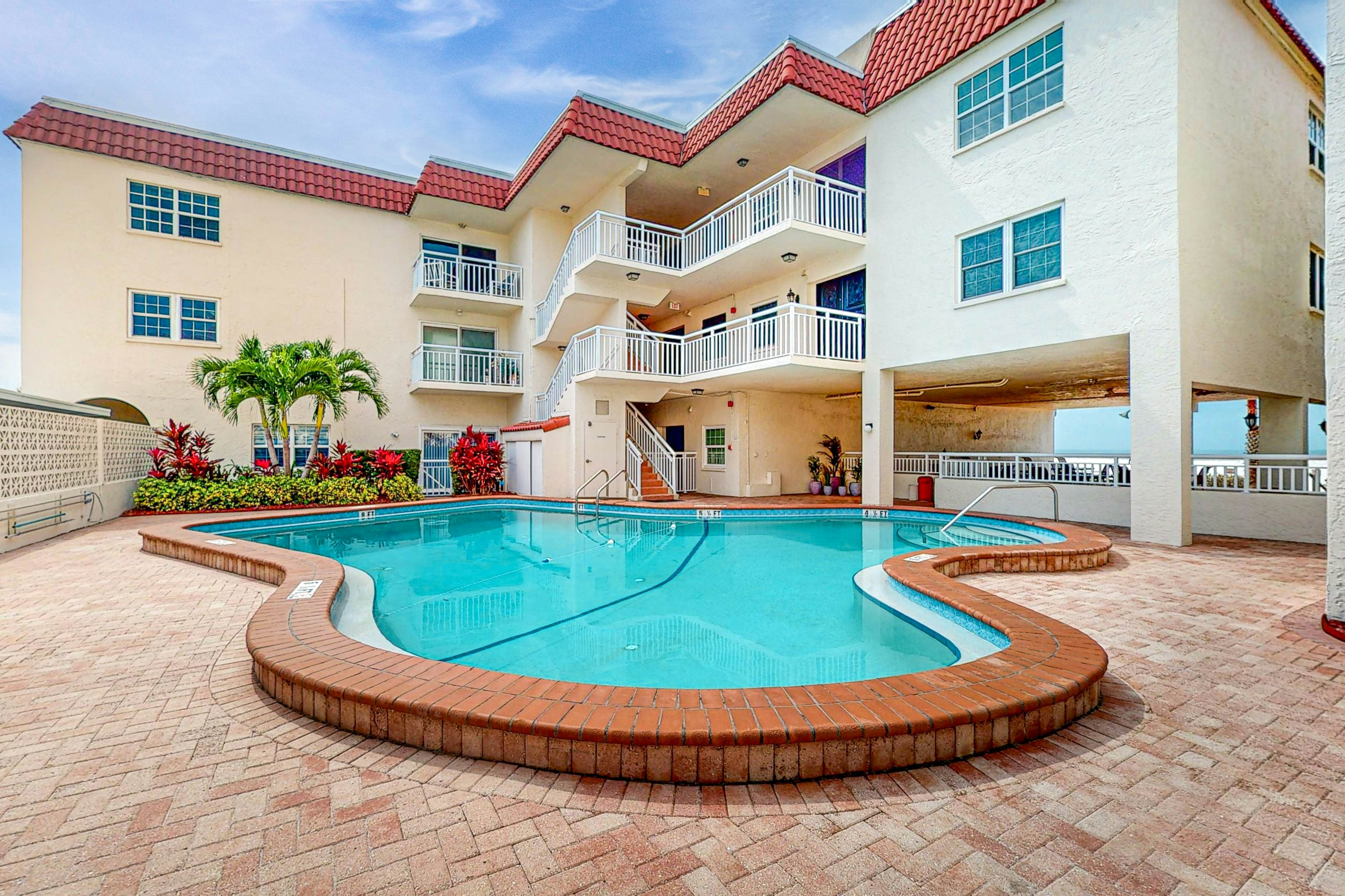 Waterfront condo with amazing ocean view, resort pool, beach access, & W/D