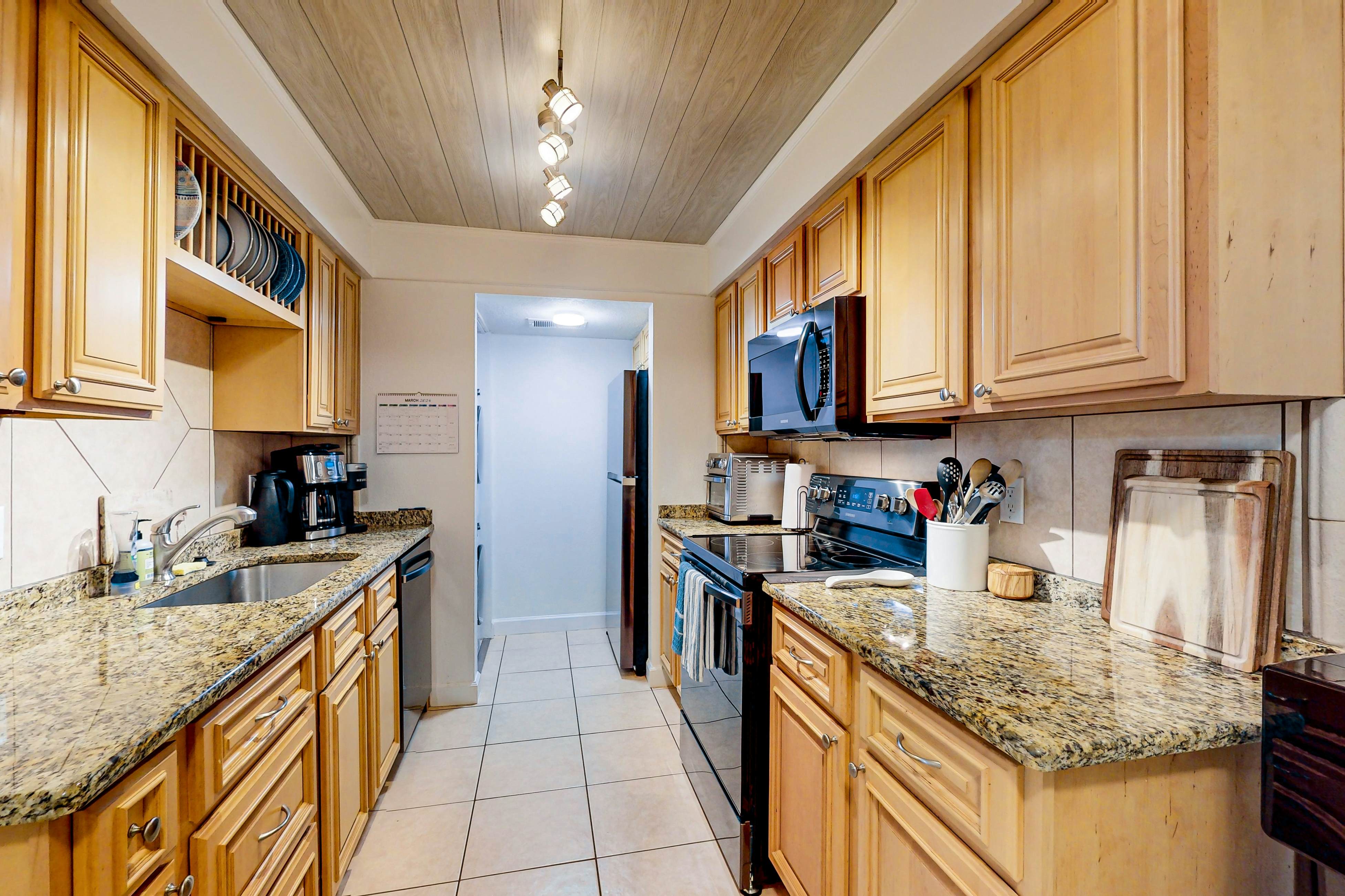 Waterfront condo with amazing ocean view, resort pool, beach access, & W/D