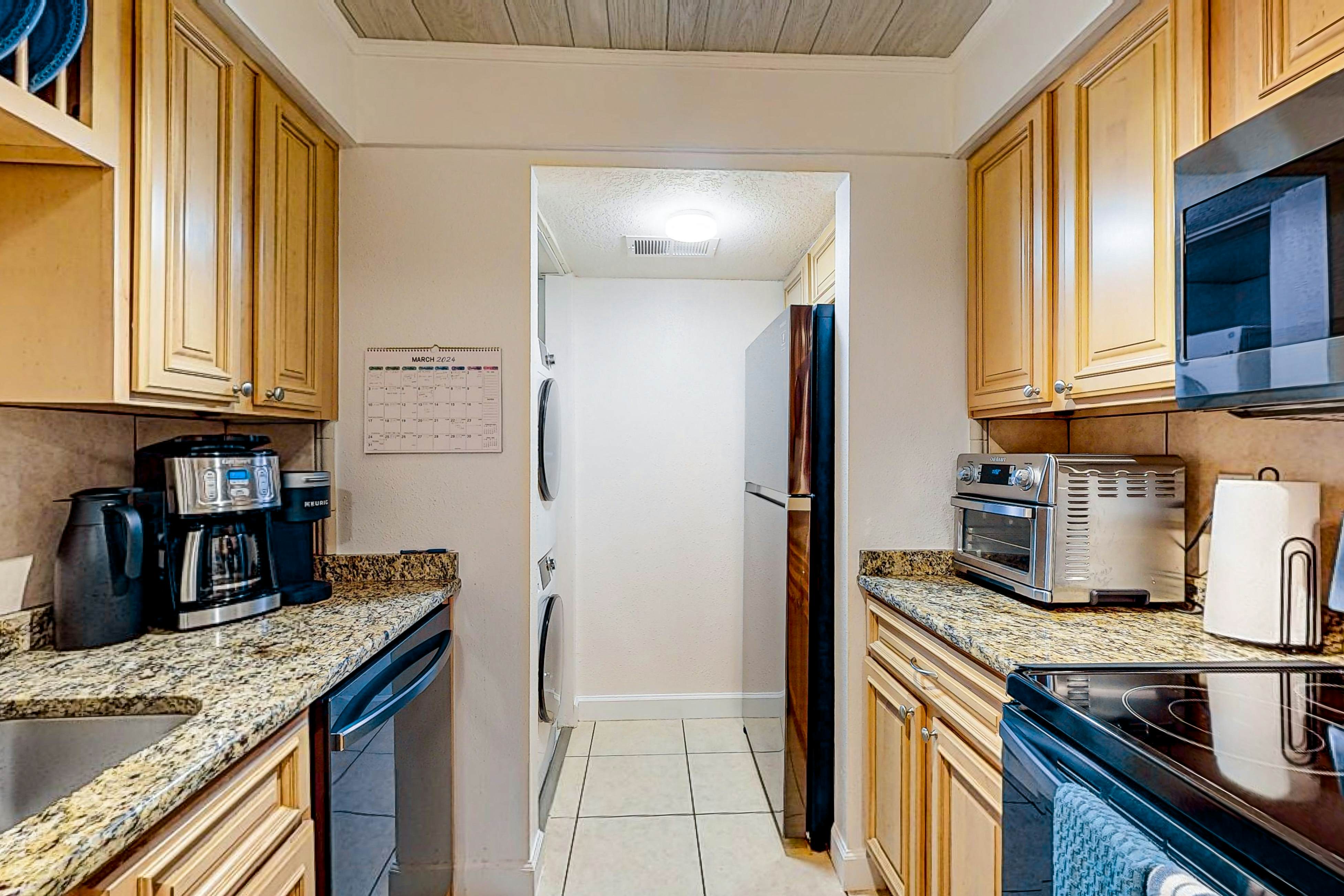 Waterfront condo with amazing ocean view, resort pool, beach access, & W/D