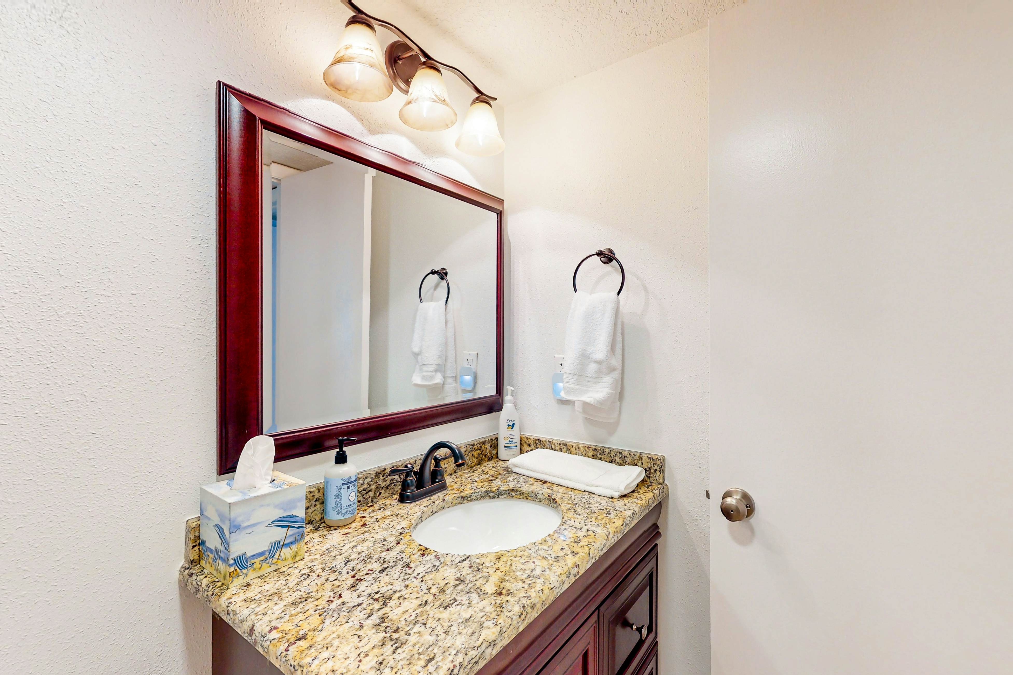 Waterfront condo with amazing ocean view, resort pool, beach access, & W/D