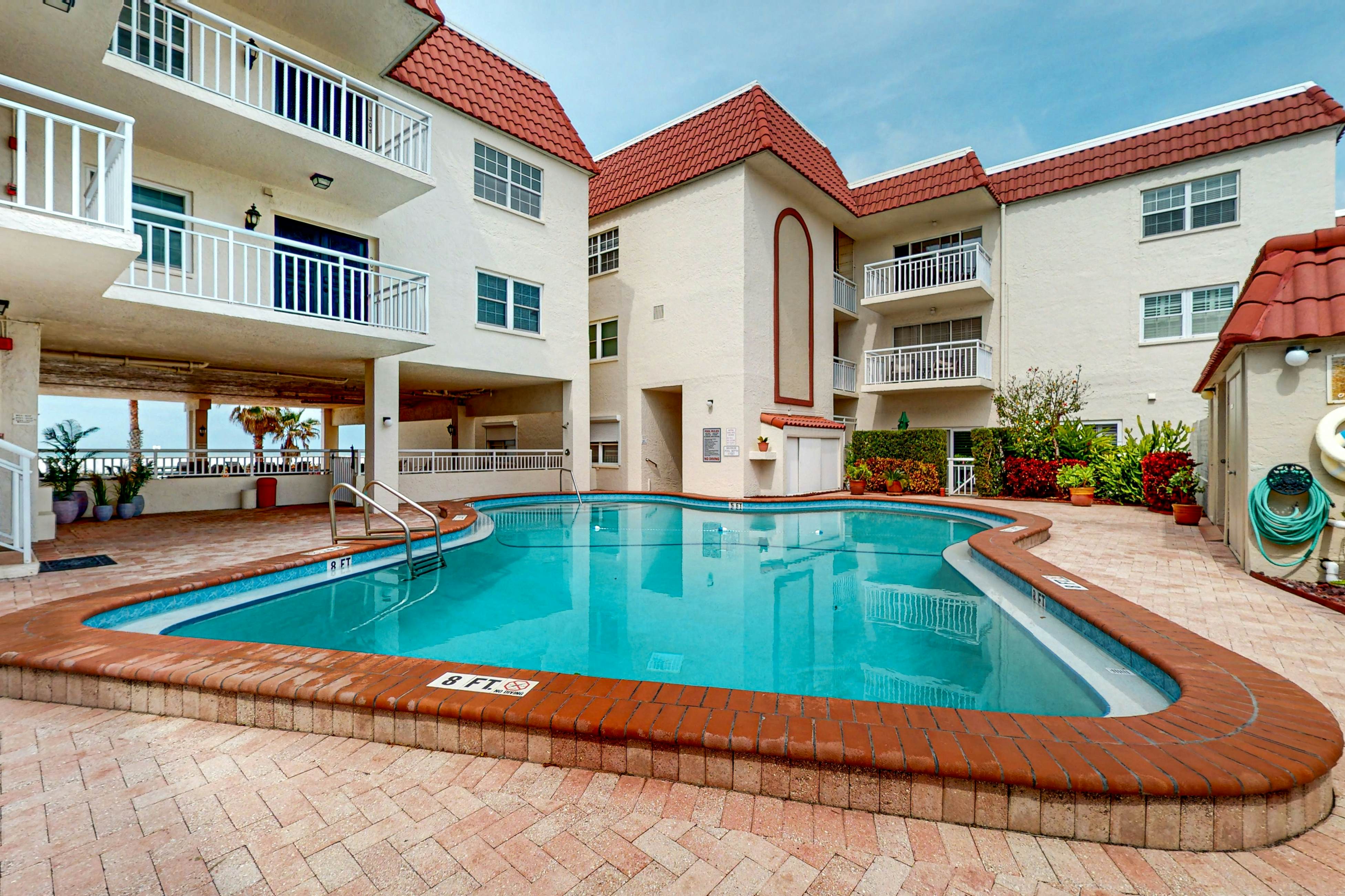 Waterfront condo with amazing ocean view, resort pool, beach access, & W/D