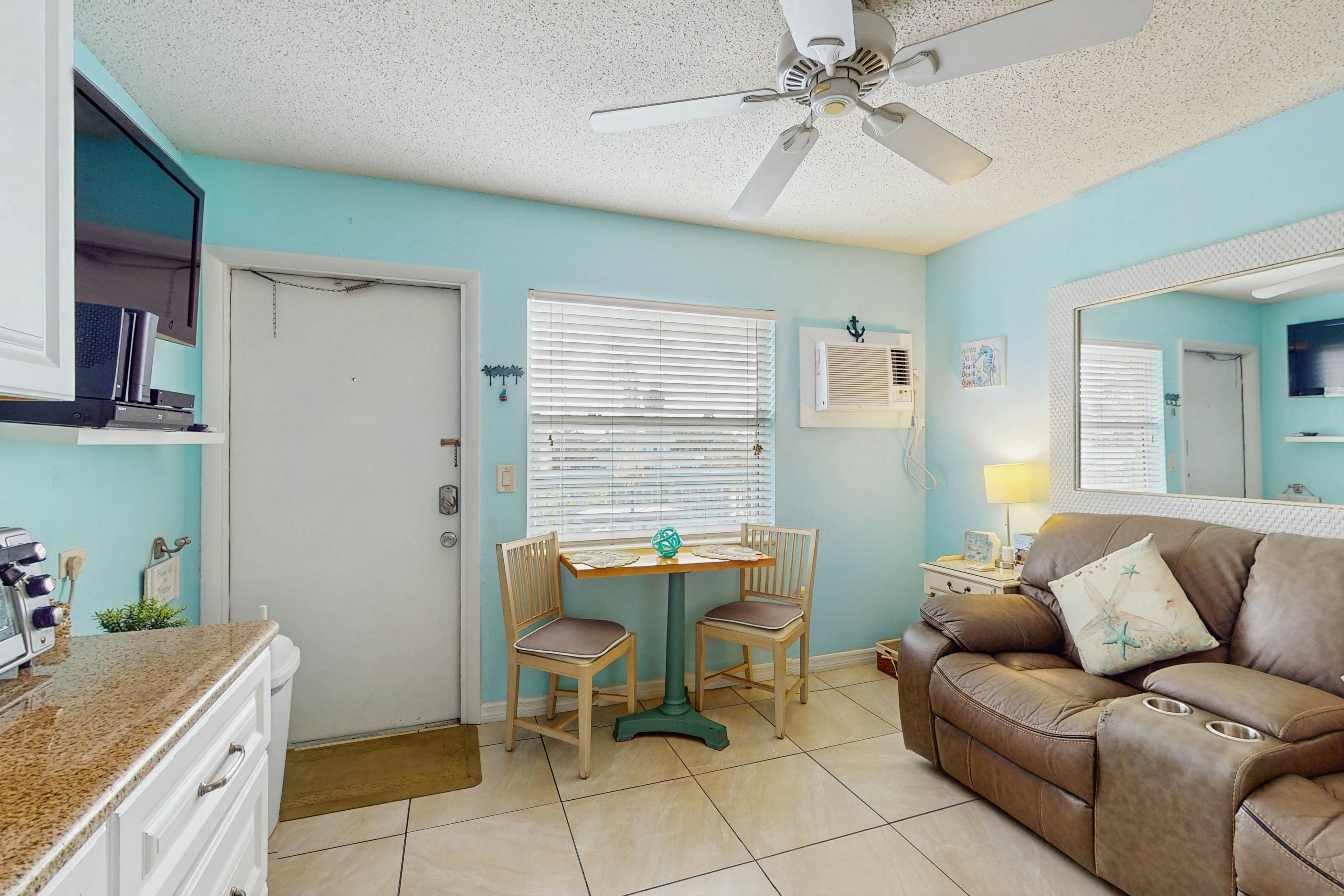 Breezy Belleair Beach condo with on-site pool, sundeck, & private beach access