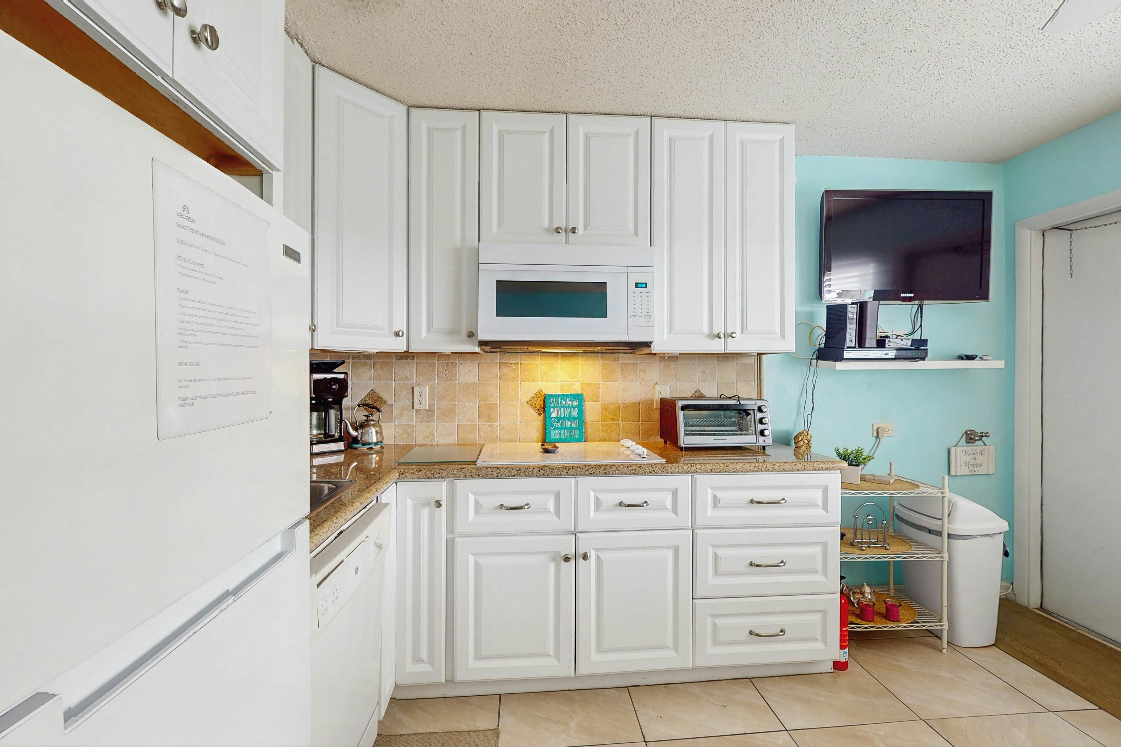 Breezy Belleair Beach condo with on-site pool, sundeck, & private beach access