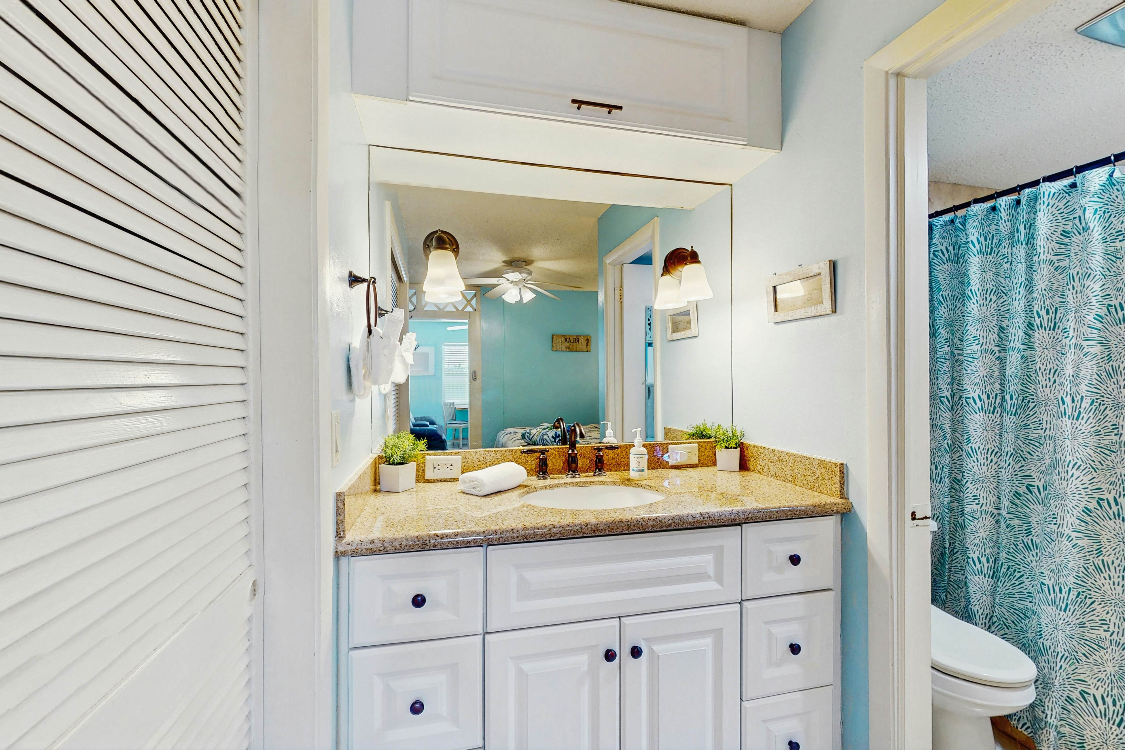 Breezy Belleair Beach condo with on-site pool, sundeck, & private beach access