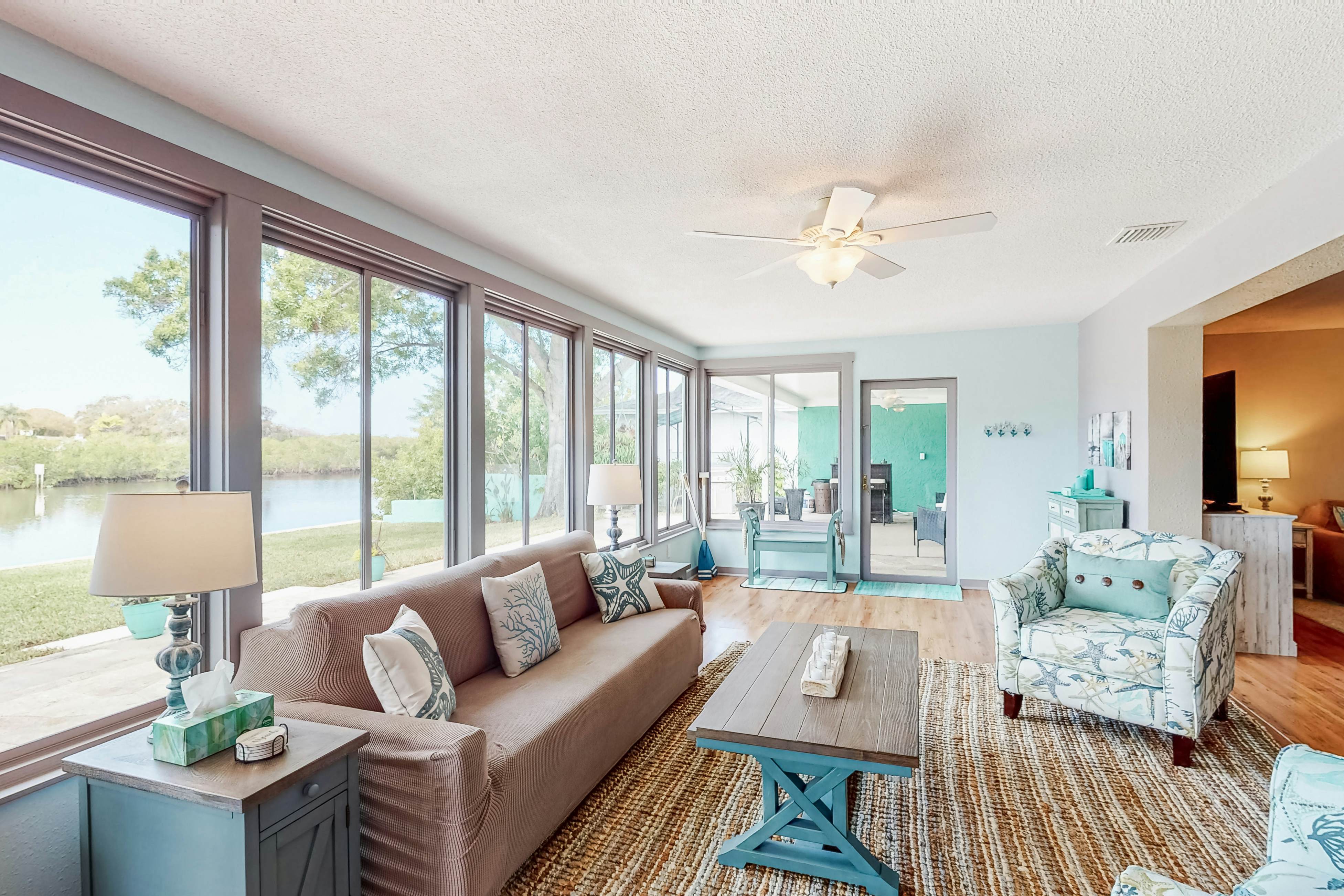 Unique tropical waterfront paradise with private dock, fast WiFi, & large yard