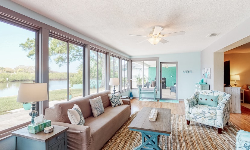 Unique Tropical Waterfront Retreat w/Private Dock, WiFi &Yard