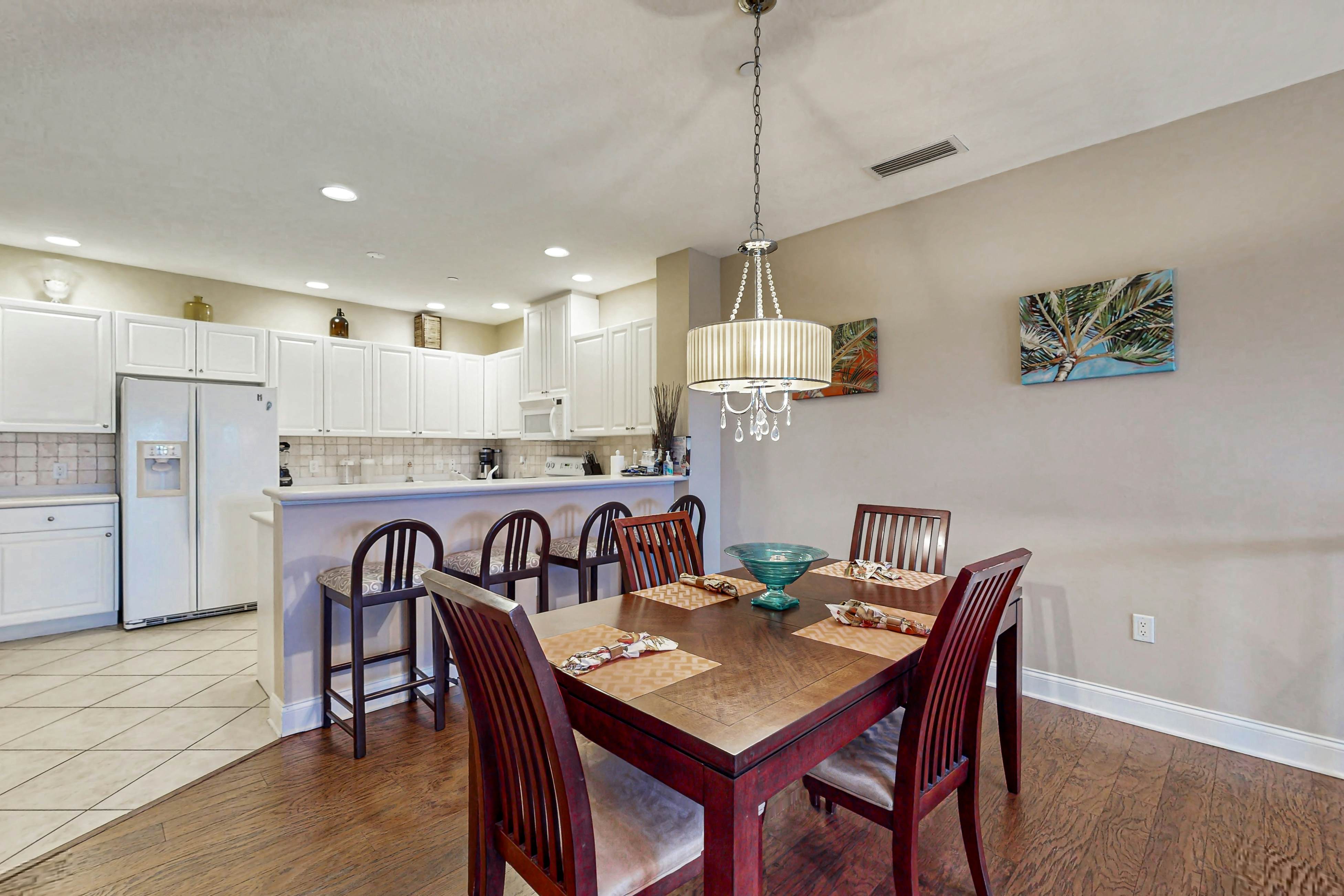 Spacious townhome in prime location w/patio, heated pool, hot tub, pool spa, gym