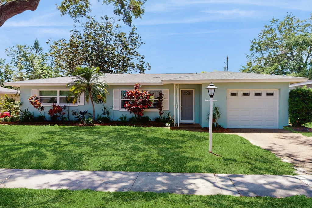 Inviting ranch home near the beach Florida room alfresco dining