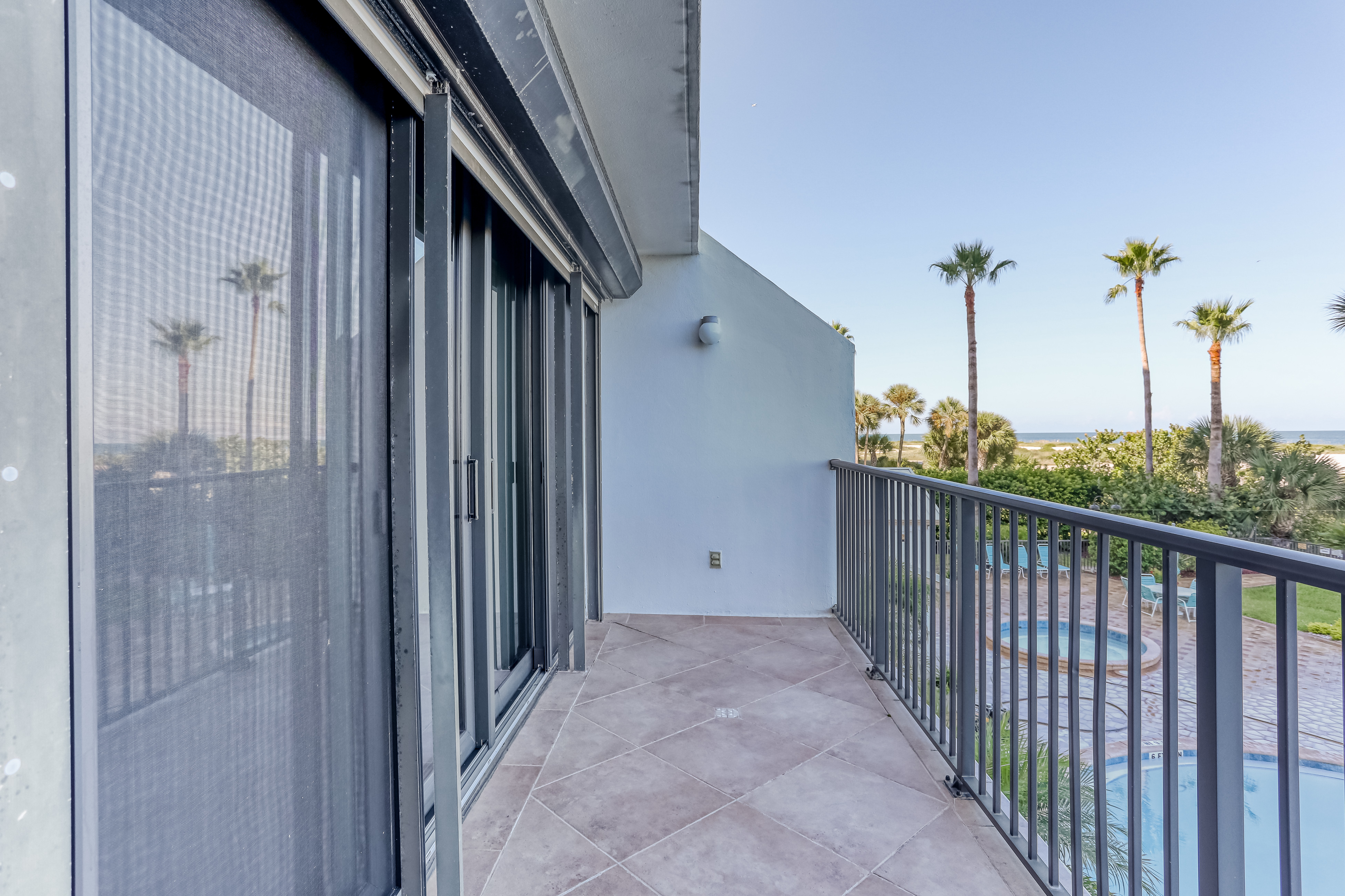 Second floor condo with pool and tennis court private WD and central AC