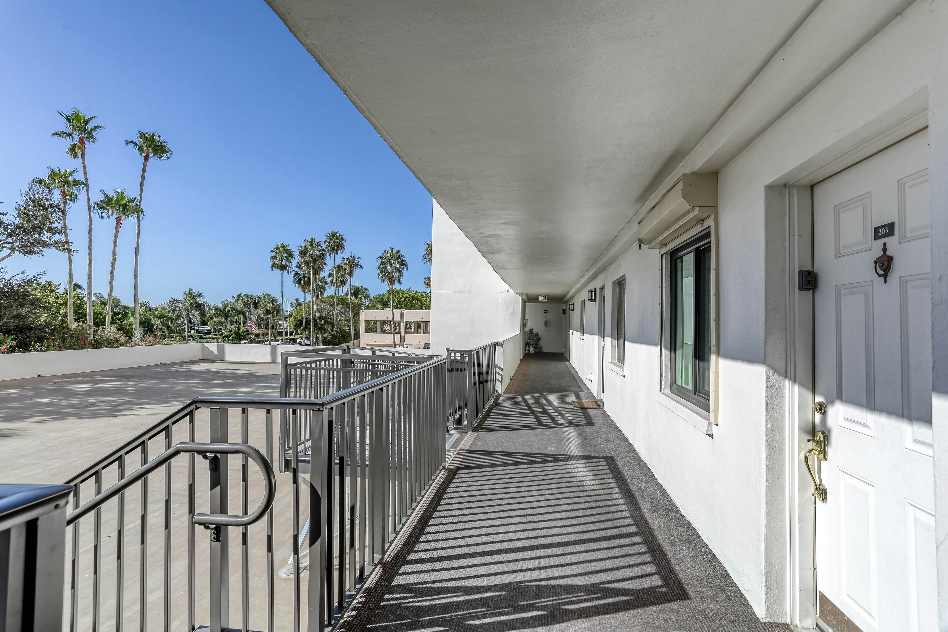 Second floor condo with pool and tennis court private WD and central AC