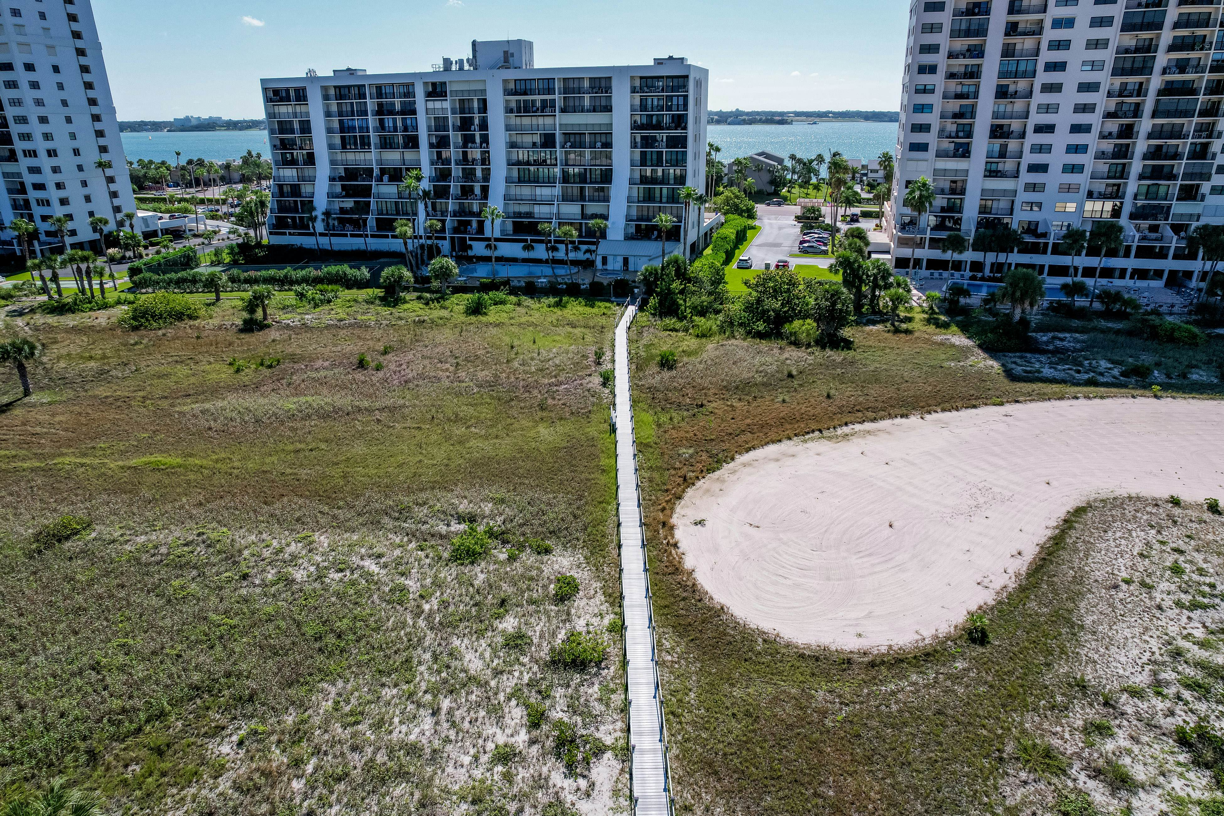 Second floor condo with pool and tennis court private WD and central AC