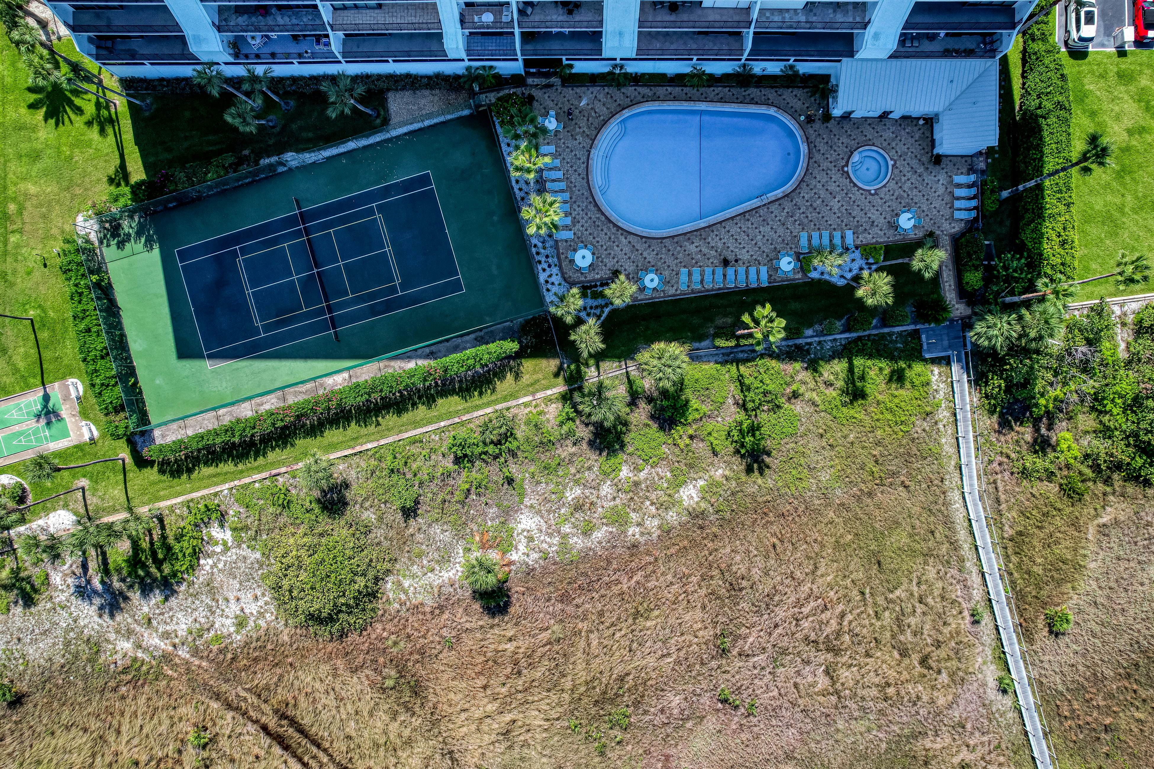 Second floor condo with pool and tennis court private WD and central AC