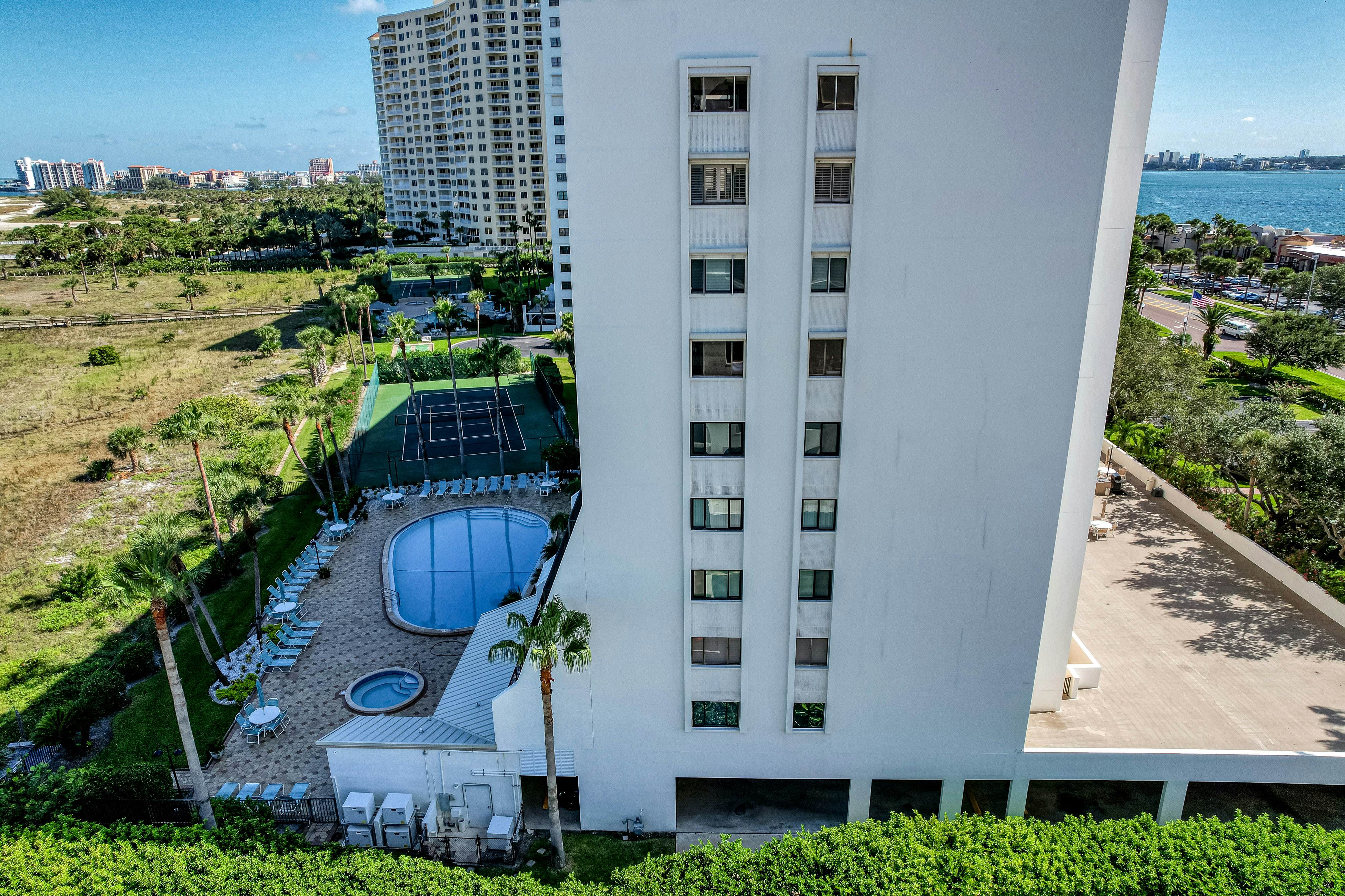 Second floor condo with pool and tennis court private WD and central AC