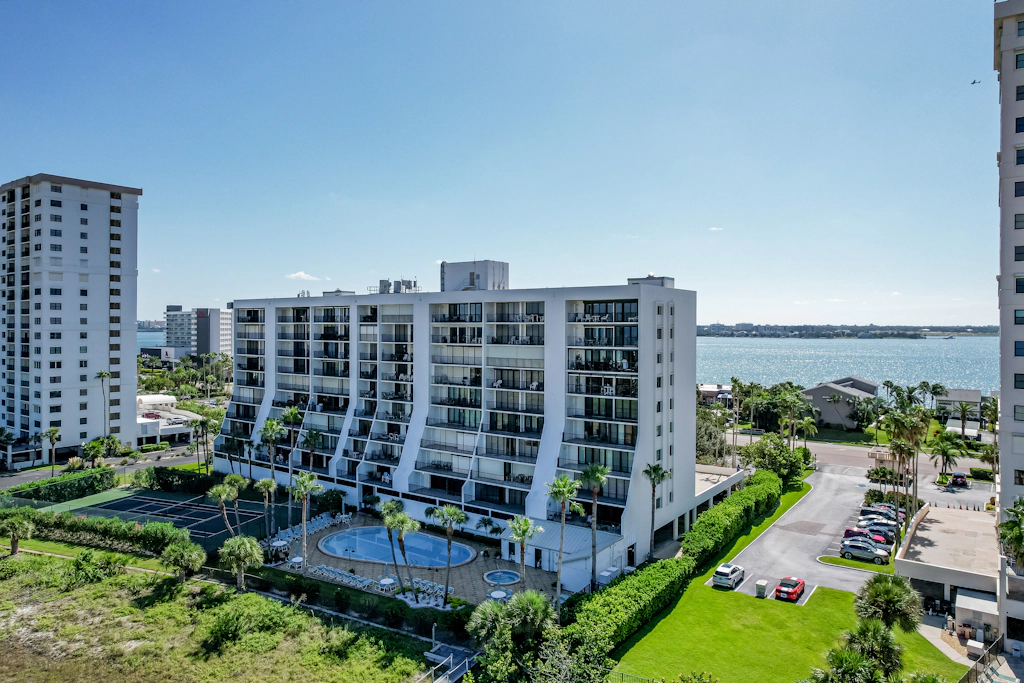 Second floor condo with pool and tennis court private WD and central AC