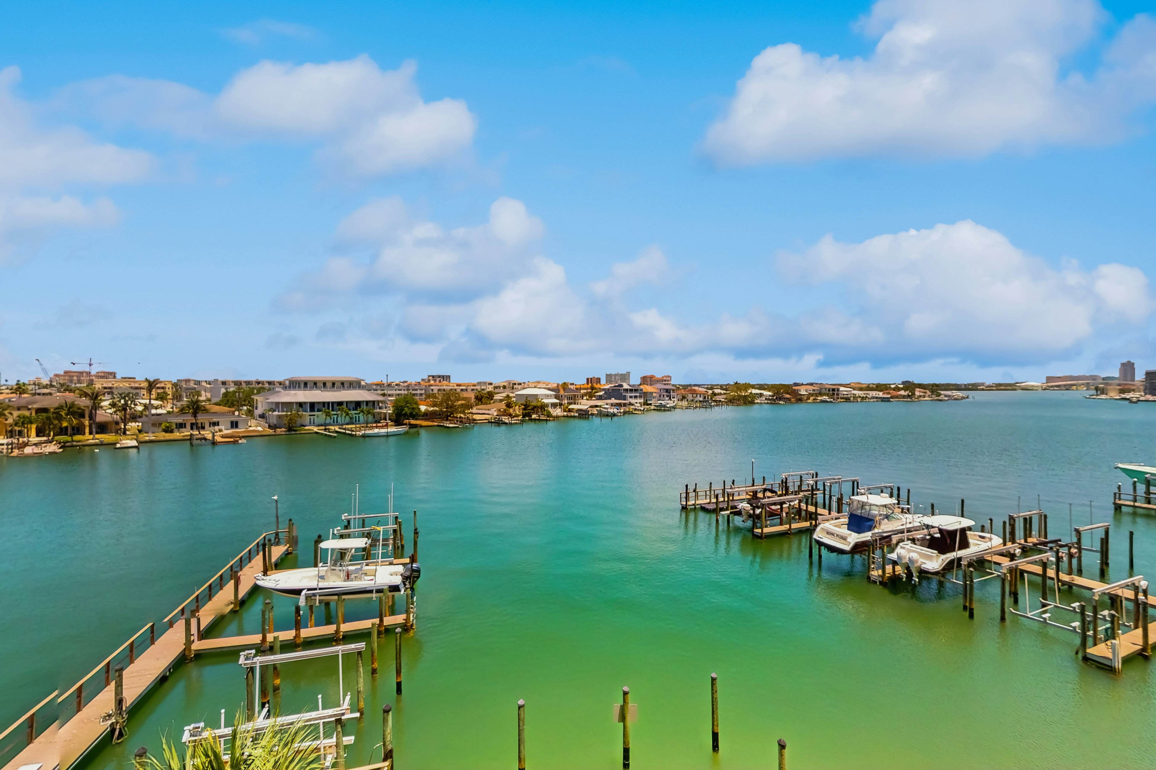 Dog-friendly bayfront 4th-floor condo with bay views, heated pool, pool spa, W/D