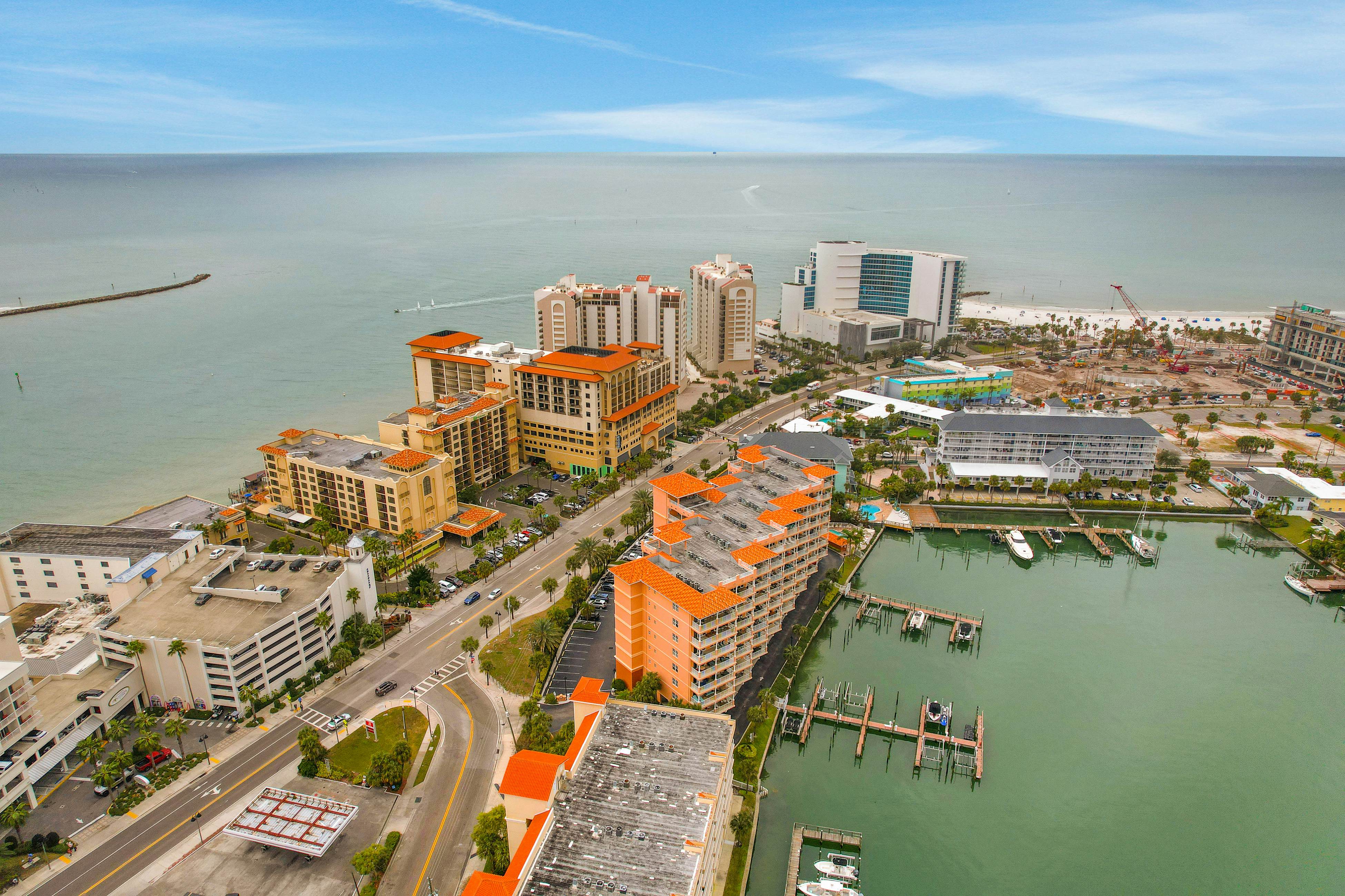 Dog-friendly bayfront 4th-floor condo with bay views, heated pool, pool spa, W/D