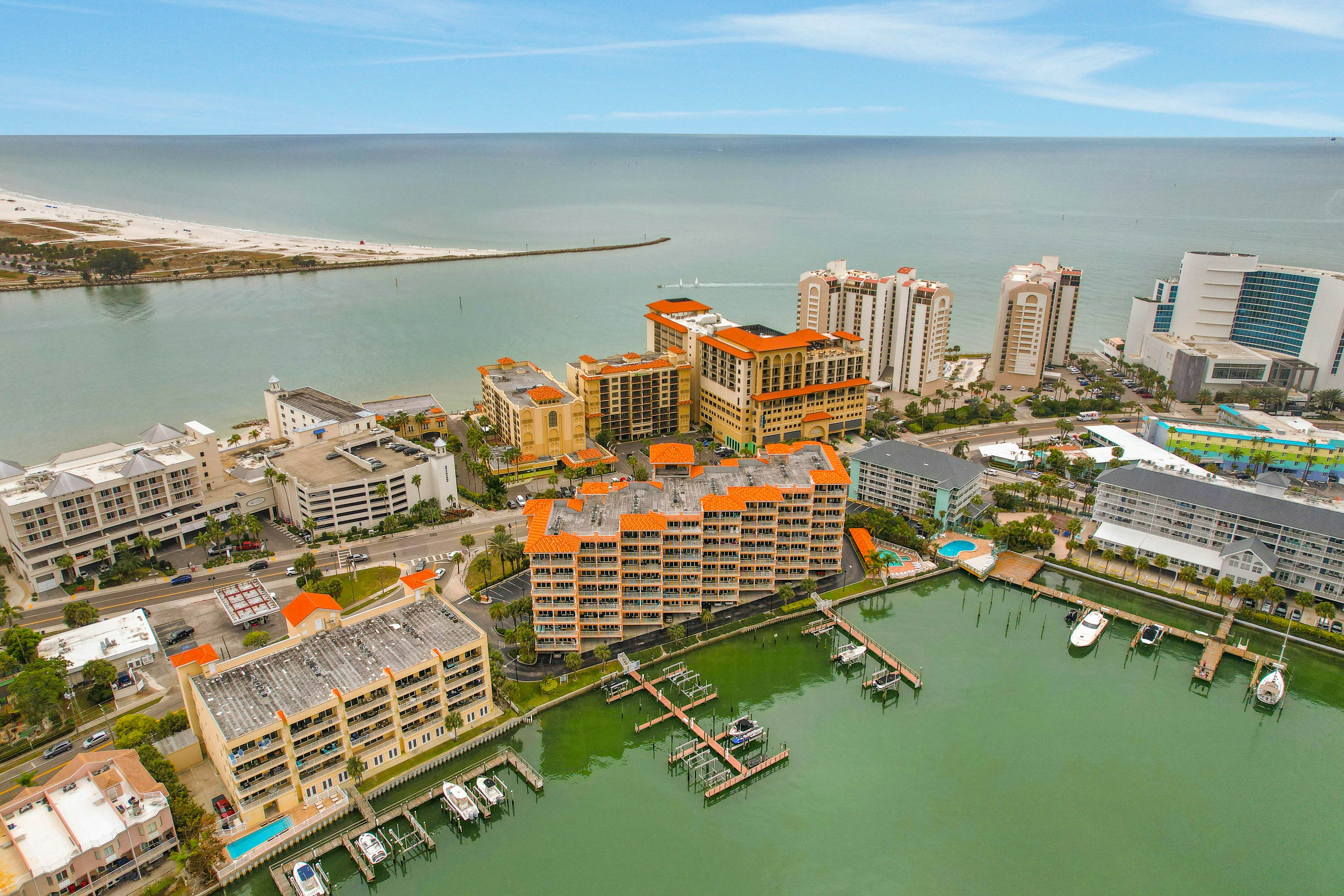 Dog-friendly bayfront 4th-floor condo with bay views, heated pool, pool spa, W/D