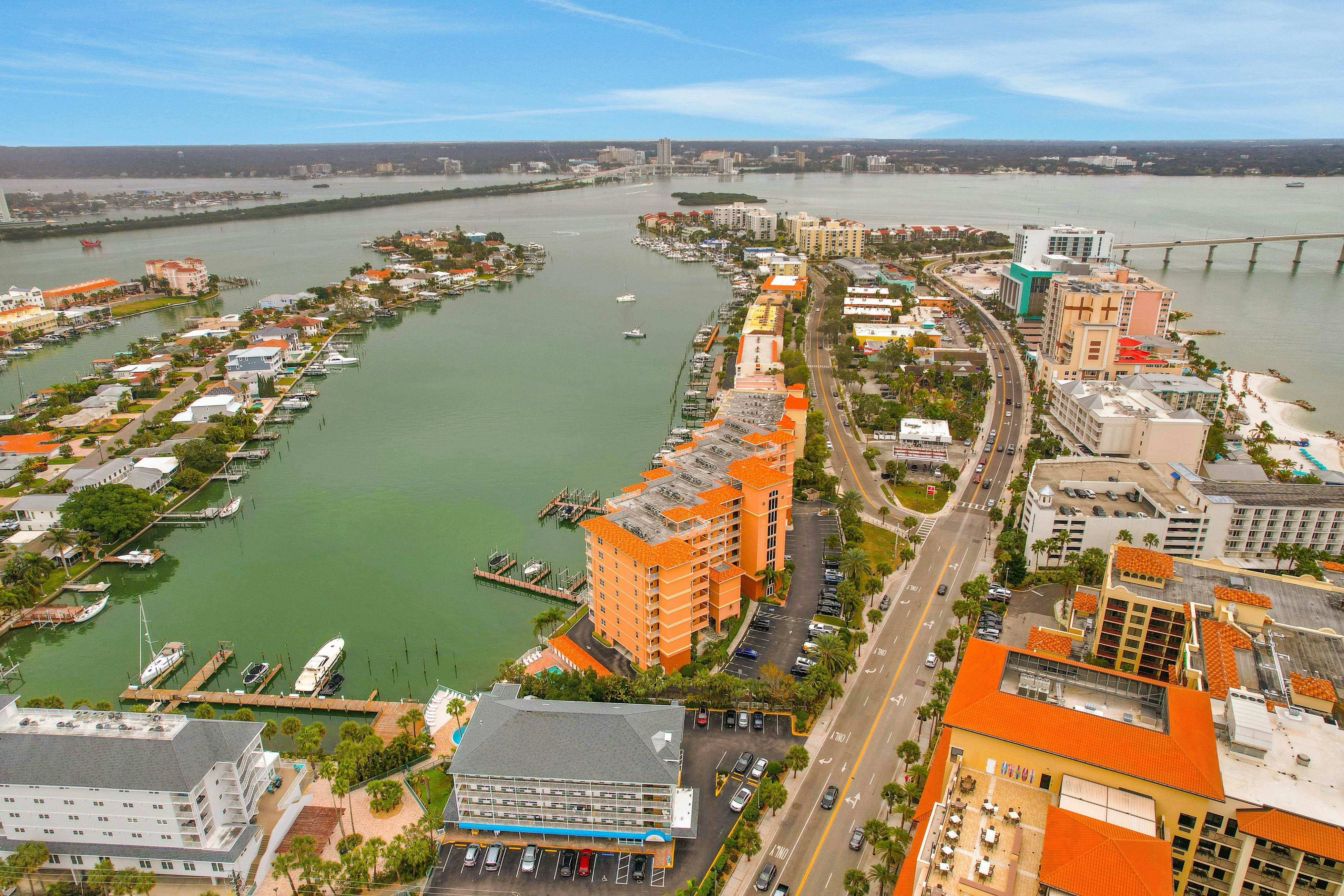 Dog-friendly bayfront 4th-floor condo with bay views, heated pool, pool spa, W/D