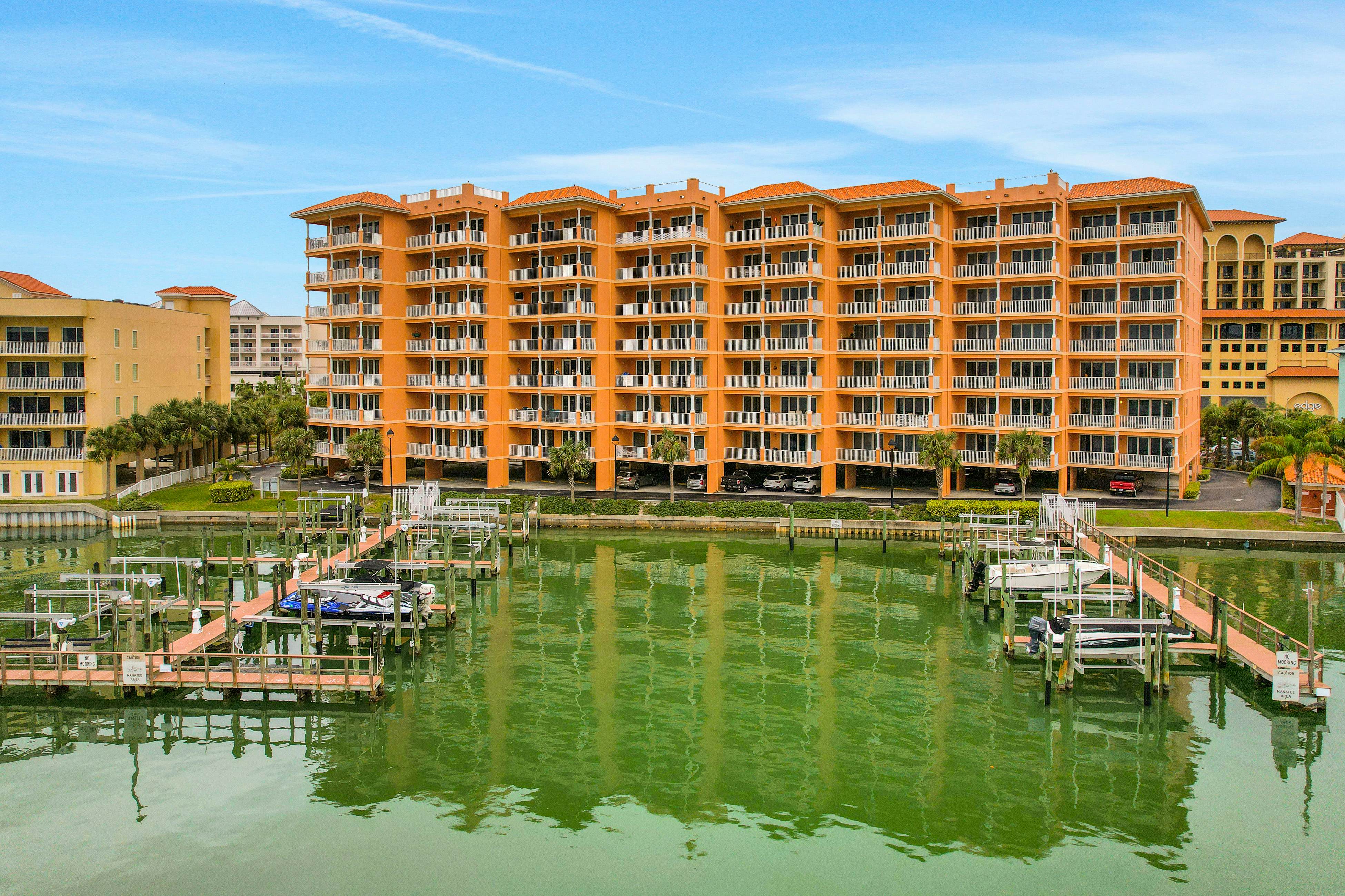 Dog-friendly bayfront 4th-floor condo with bay views, heated pool, pool spa, W/D