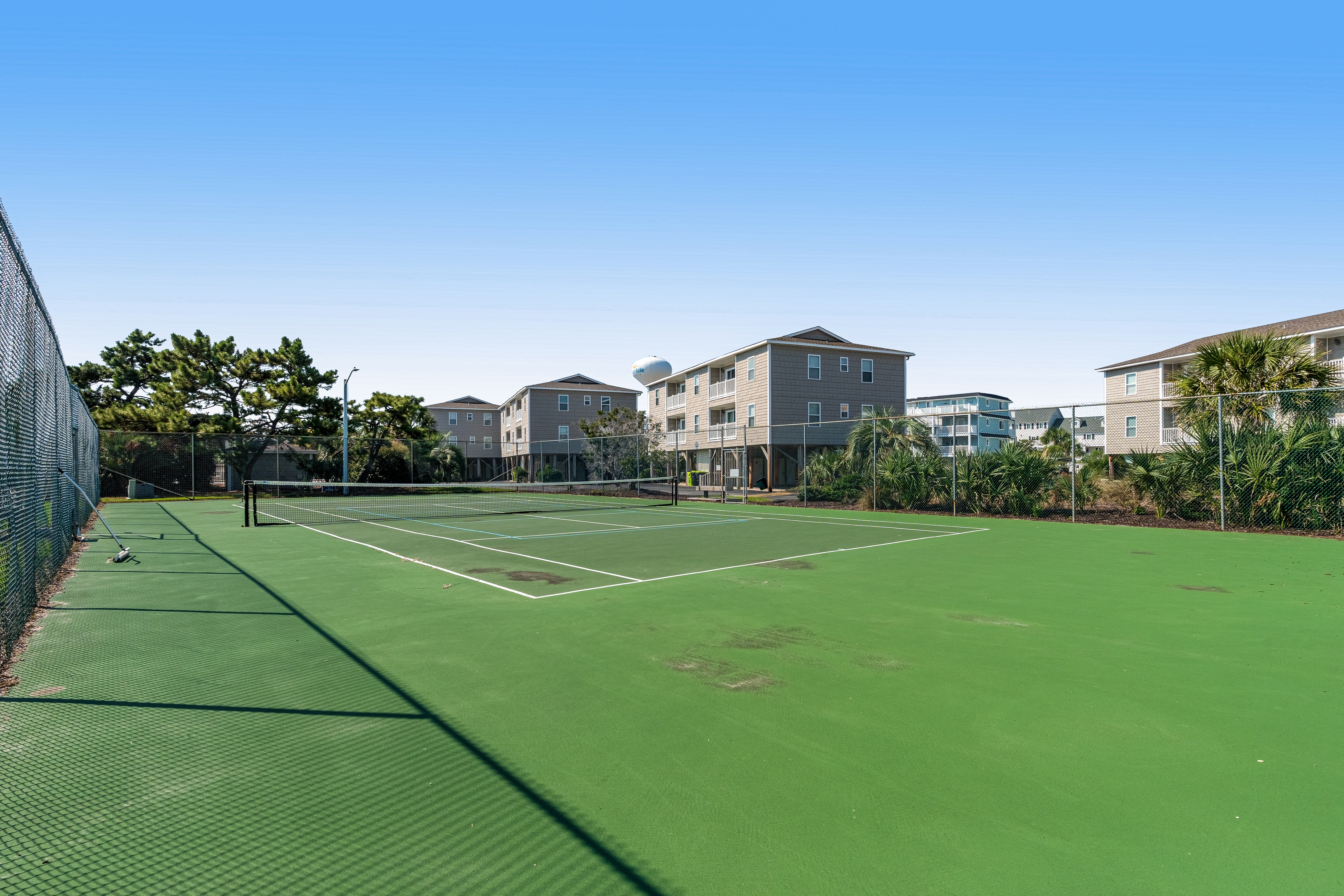 Across the street from beach access with pool & alfresco deck - dog-friendly