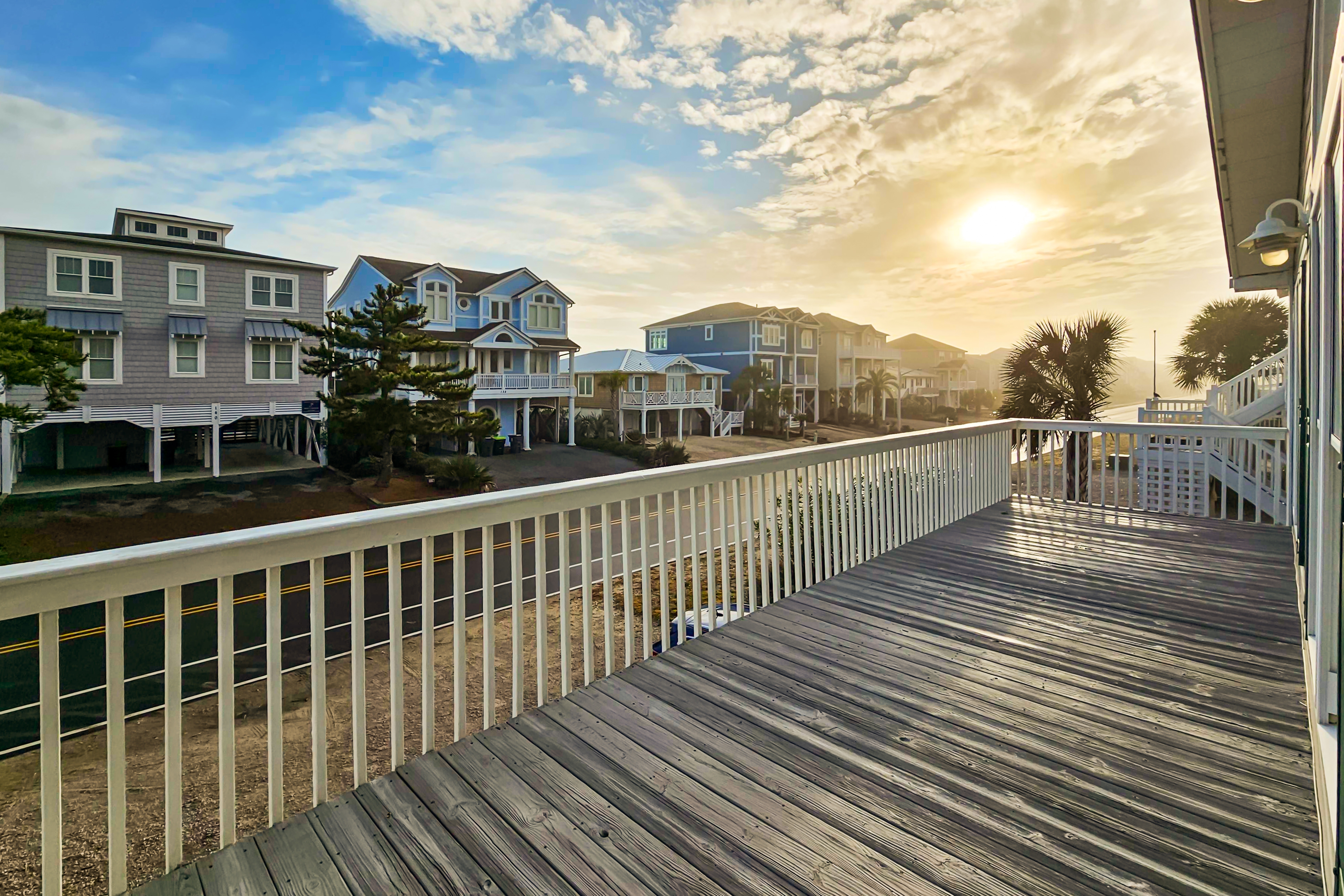 2nd-row modern home with beach access, trailer parking, deck, & outdoor shower