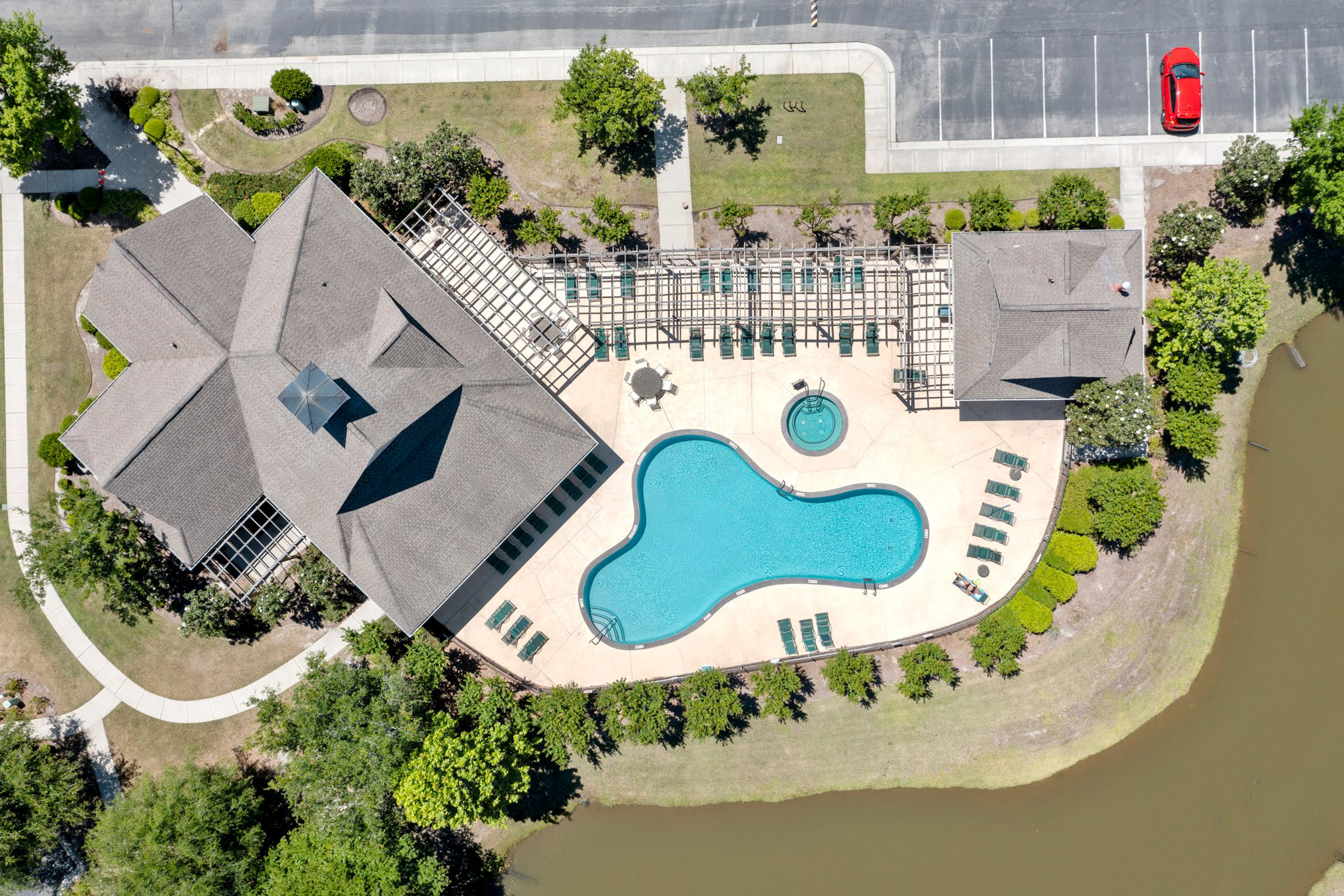 Dreamy lakefront escape on 18th fairway with pools, tennis, & elevator