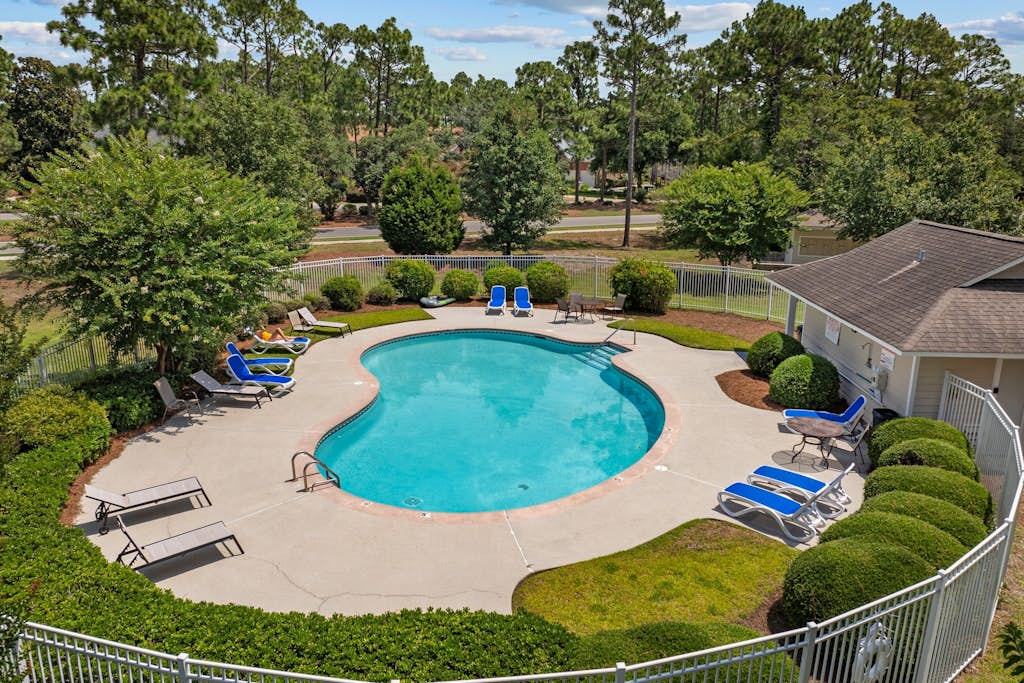 Coastal Condo with golf course view and shared pool access